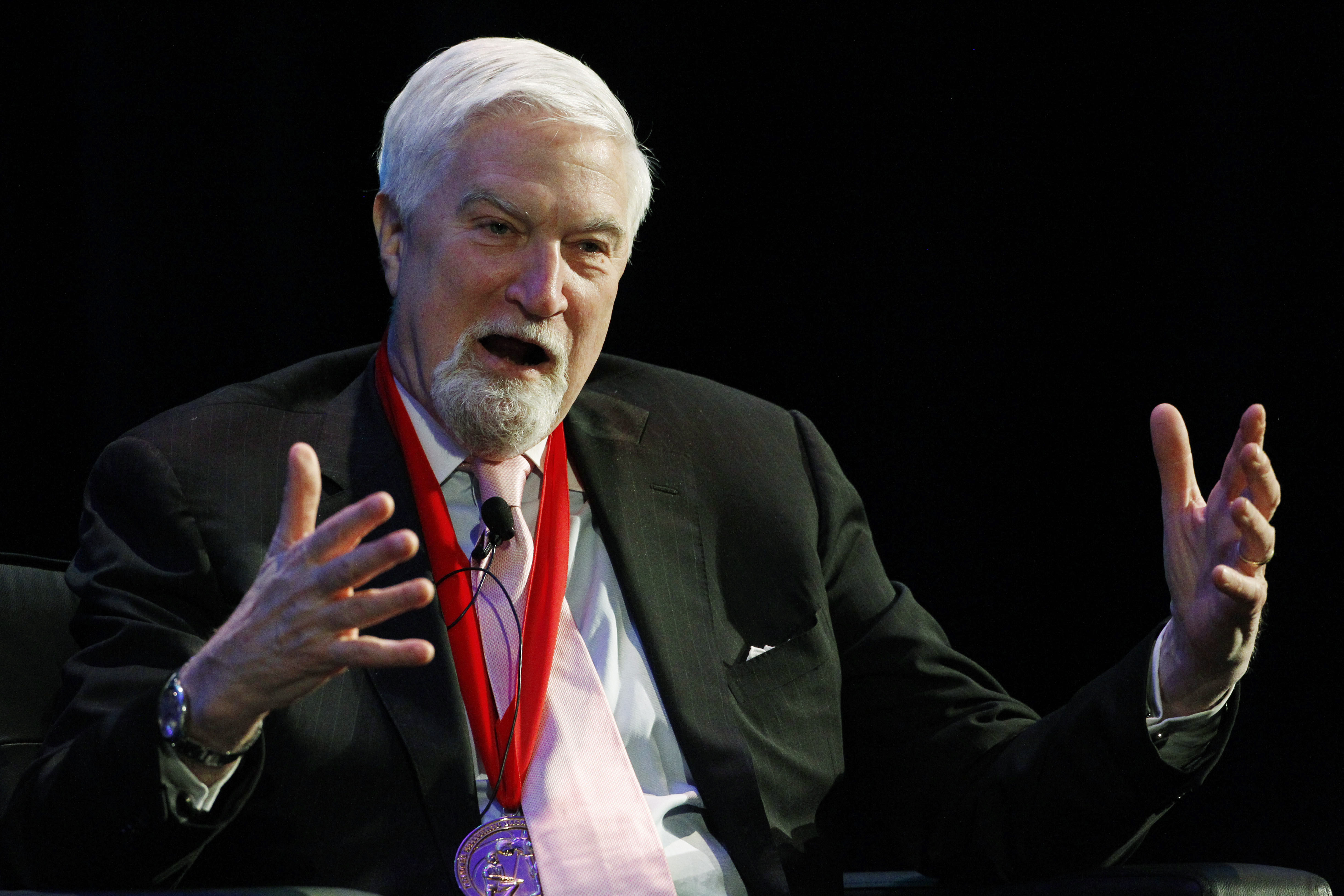 FILE - Tom McMillen speaks at the 2013 National Collegiate Basketball Hall of Fame induction ceremony, Sunday, Nov. 24, 2013, in Kansas City, Mo. McMillen, president and CEO of the association representing athletic directors of Football Bowl Subdivision schools, announced Thursday, May 16, 2024, he would step down this fall to pursue other opportunities.