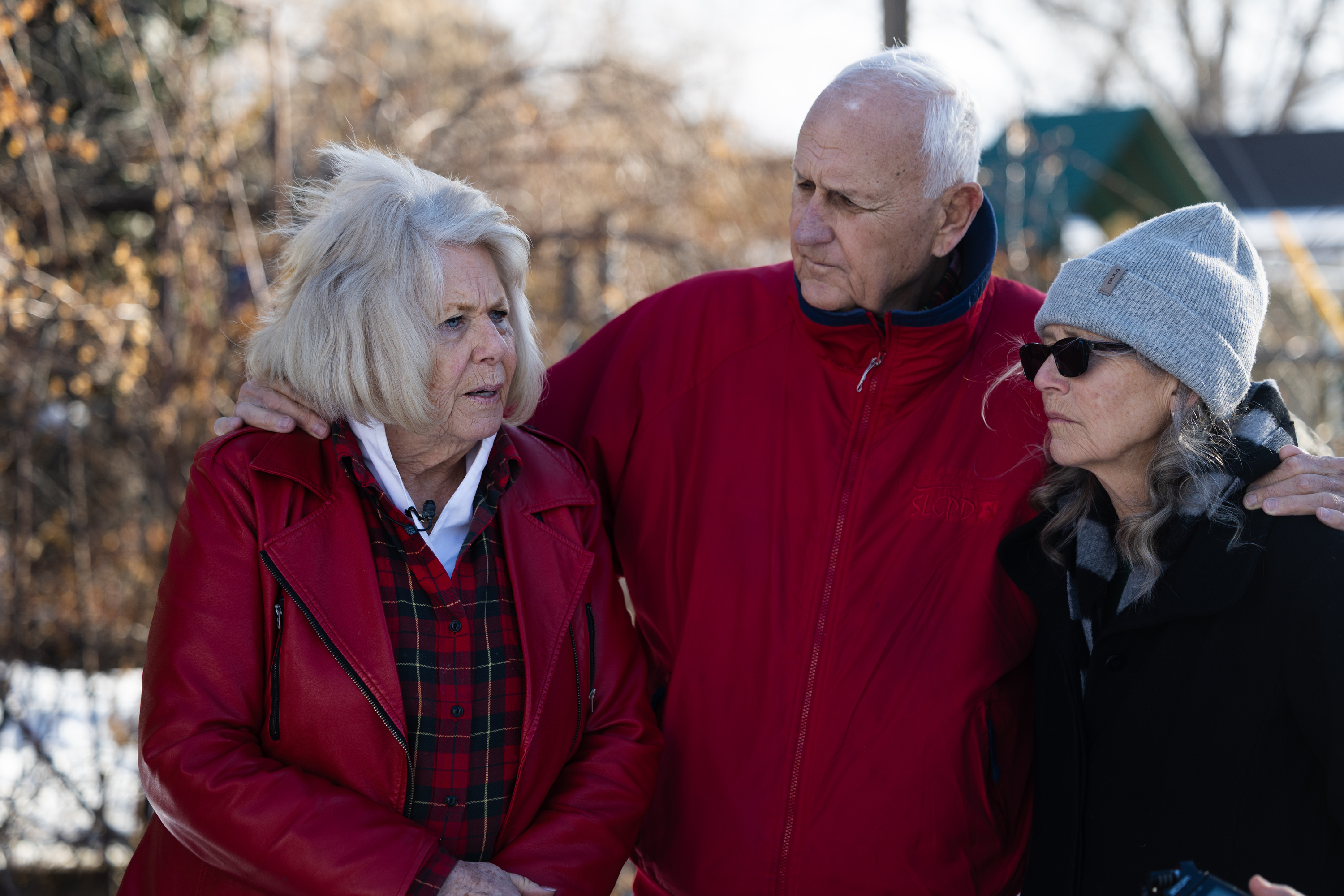 Leslie Moore, left, Dave Moore and Ann Marie Herpich embrace while remembering Jordan Rasmussen at Wasatch Lawn Memorial Park and Mortuary in Millcreek on March 5, 2023.