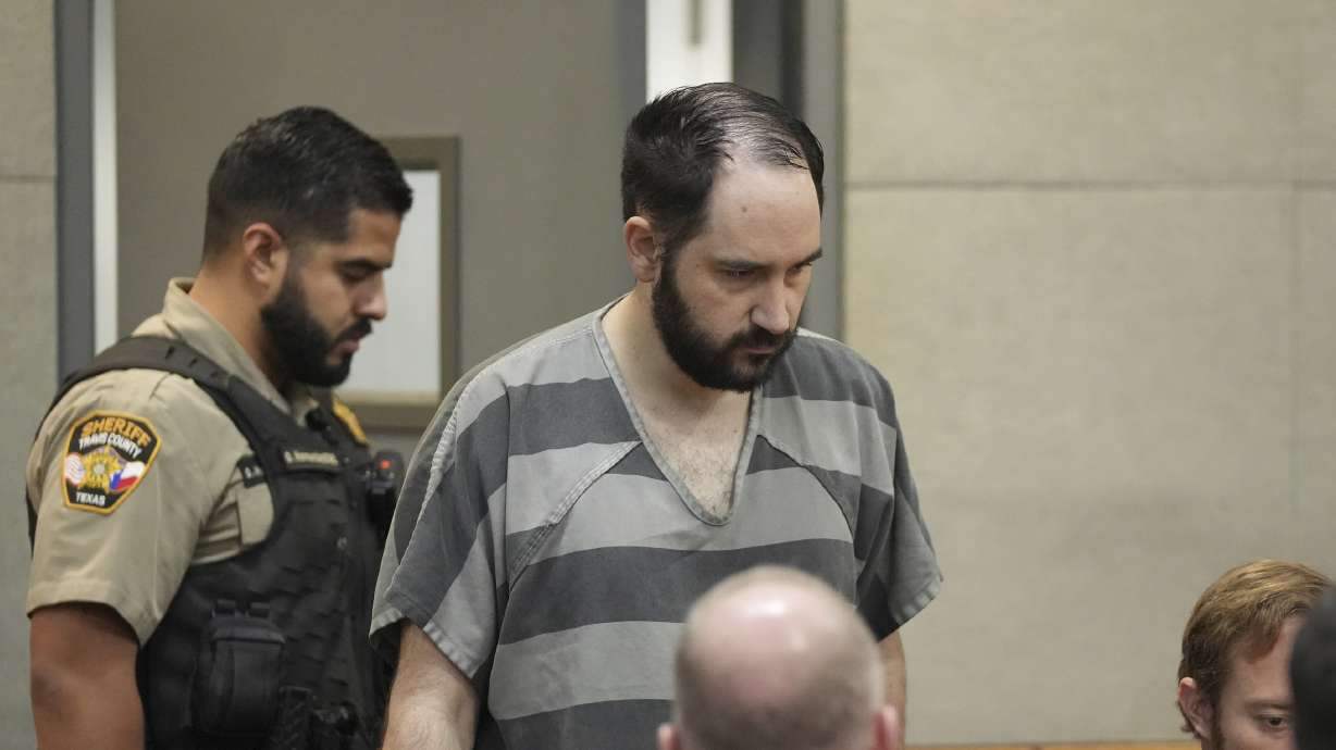 Daniel Perry enters the courtroom at the Blackwell-Thurman Criminal Justice Center, May 10, 2023, in Austin, Texas. The Texas Board of Pardons and Paroles on Thursday recommended a full pardon for Perry.