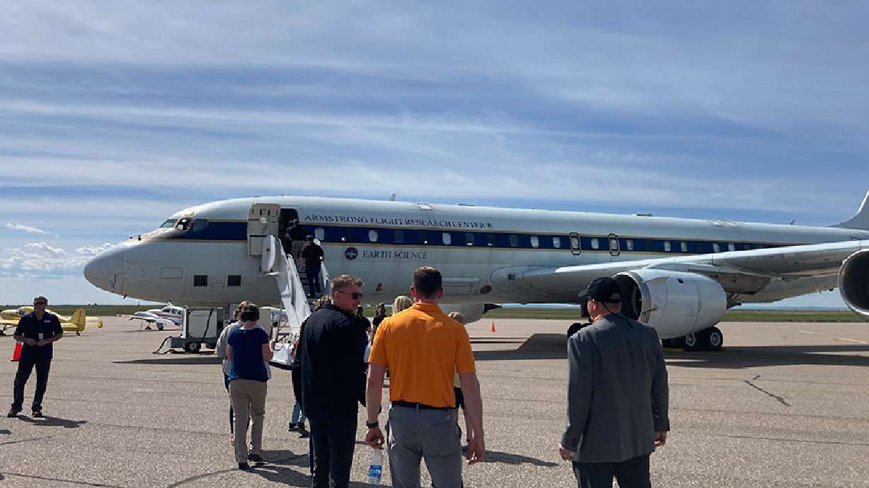 A NASA jet that served as the first and largest flying science laboratory for 37 years landed at its new home in Idaho on Wednesday.