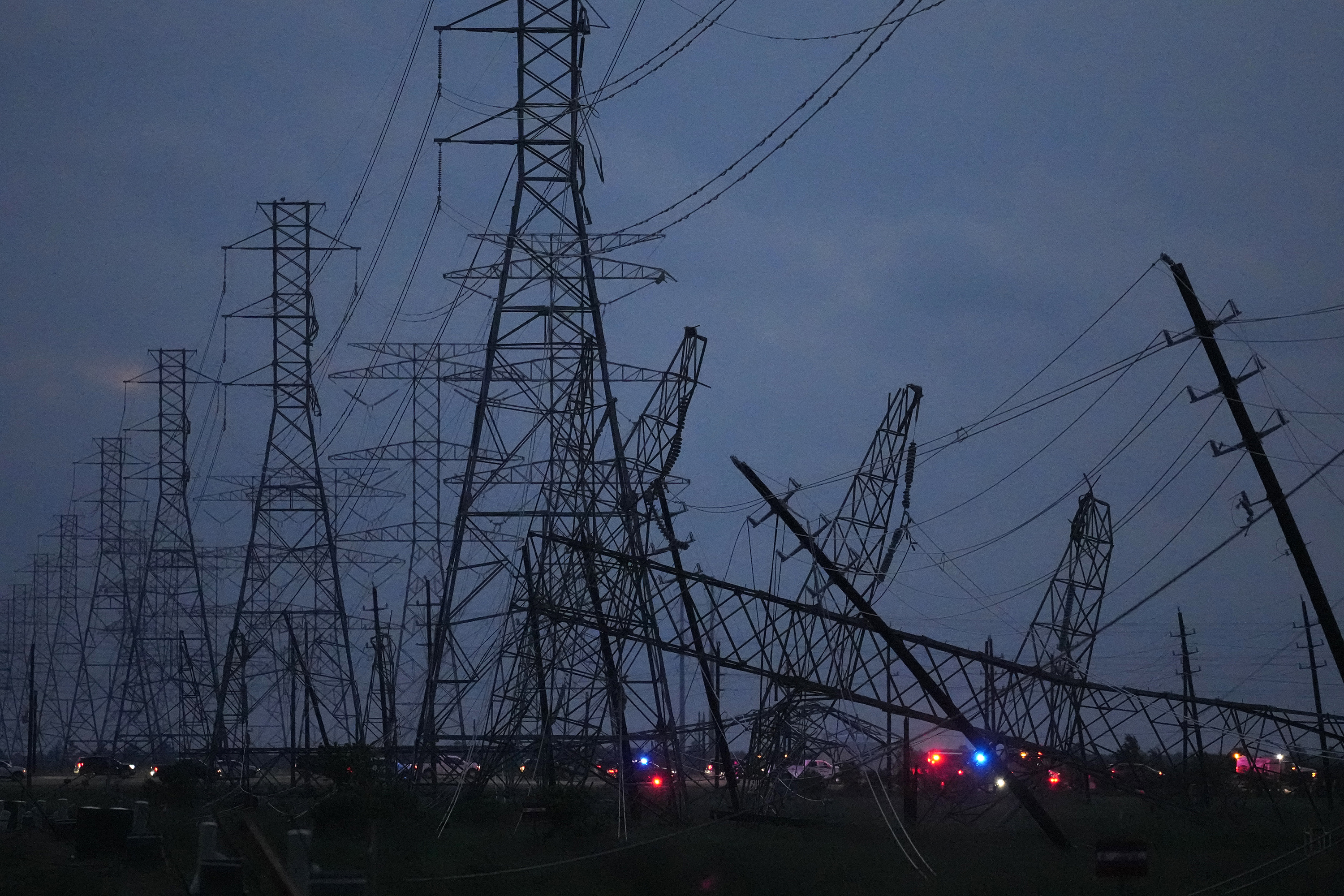 Transmission power lines are down near the Grand Parkway and West Road after a storm Thursday in Cypress, Texas.