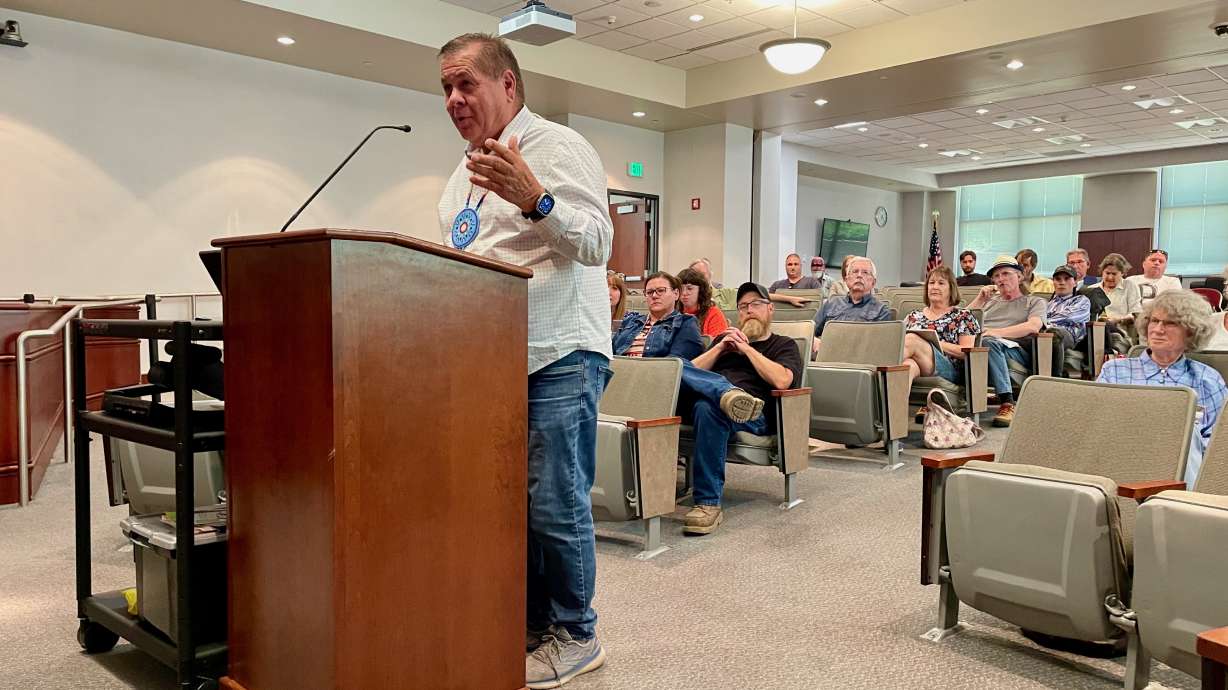 Darren Parry, former chairman of the Northwestern Band of the Shoshone Nation, voices his concerns with the proposed Weber County inland port project at a meeting in Ogden on Thursday.