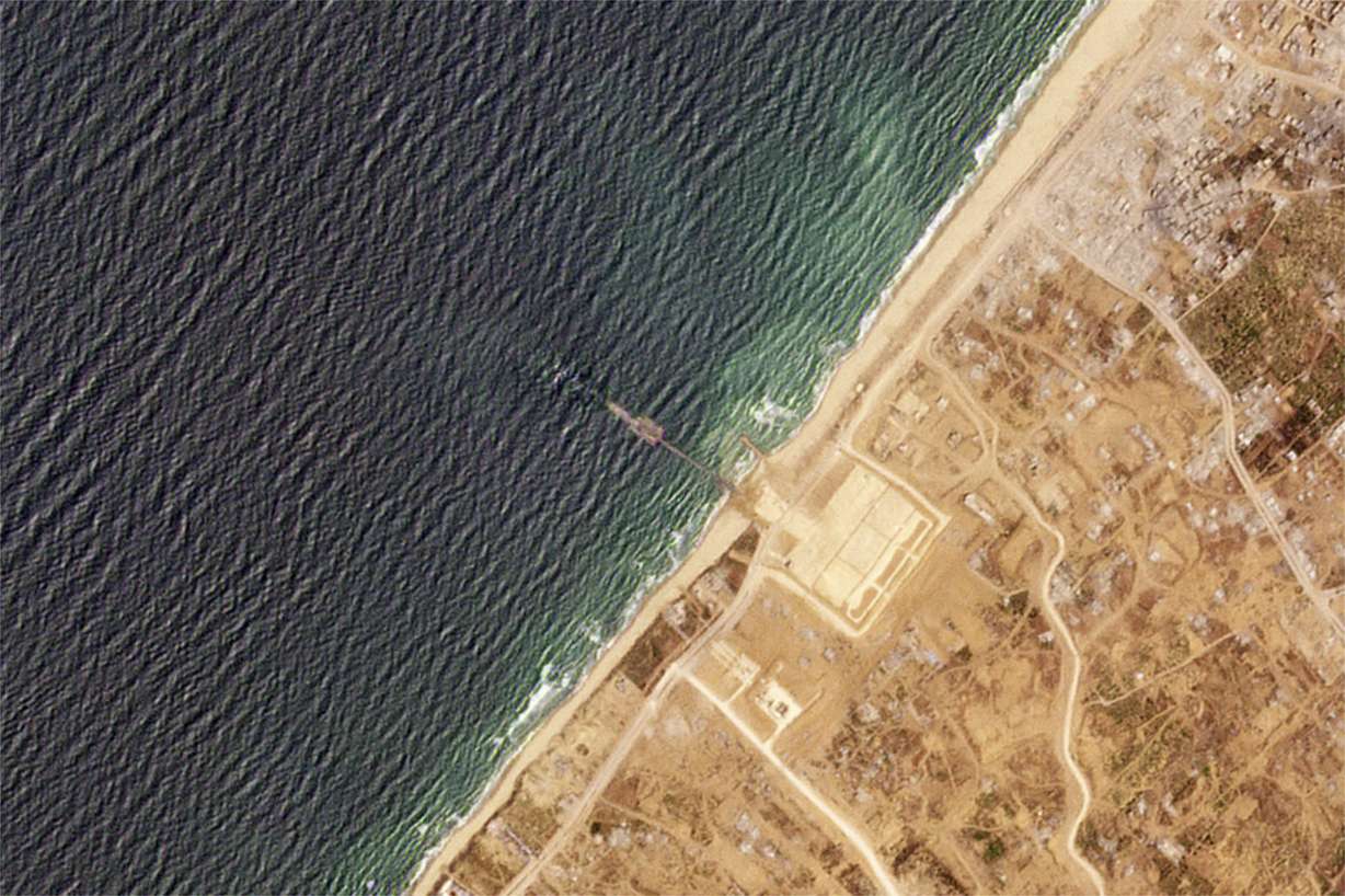 This satellite image from Planet Labs PBC shows a pier installed by the U.S. military in the Gaza Strip on Thursday.