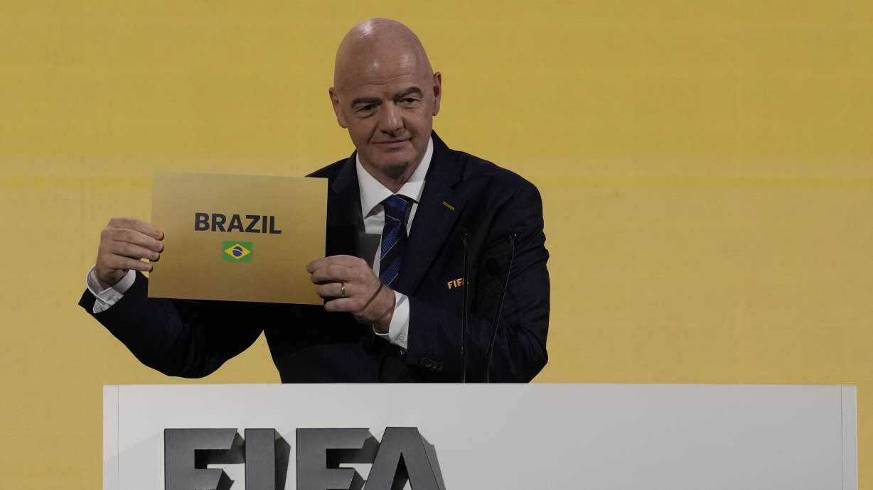 FIFA President Gianni Infantino announces that Brazil is chosen to host soccer's 2027 Women's World Cup at the FIFA Congress in Bangkok, Thailand, Friday, May 17, 2024.