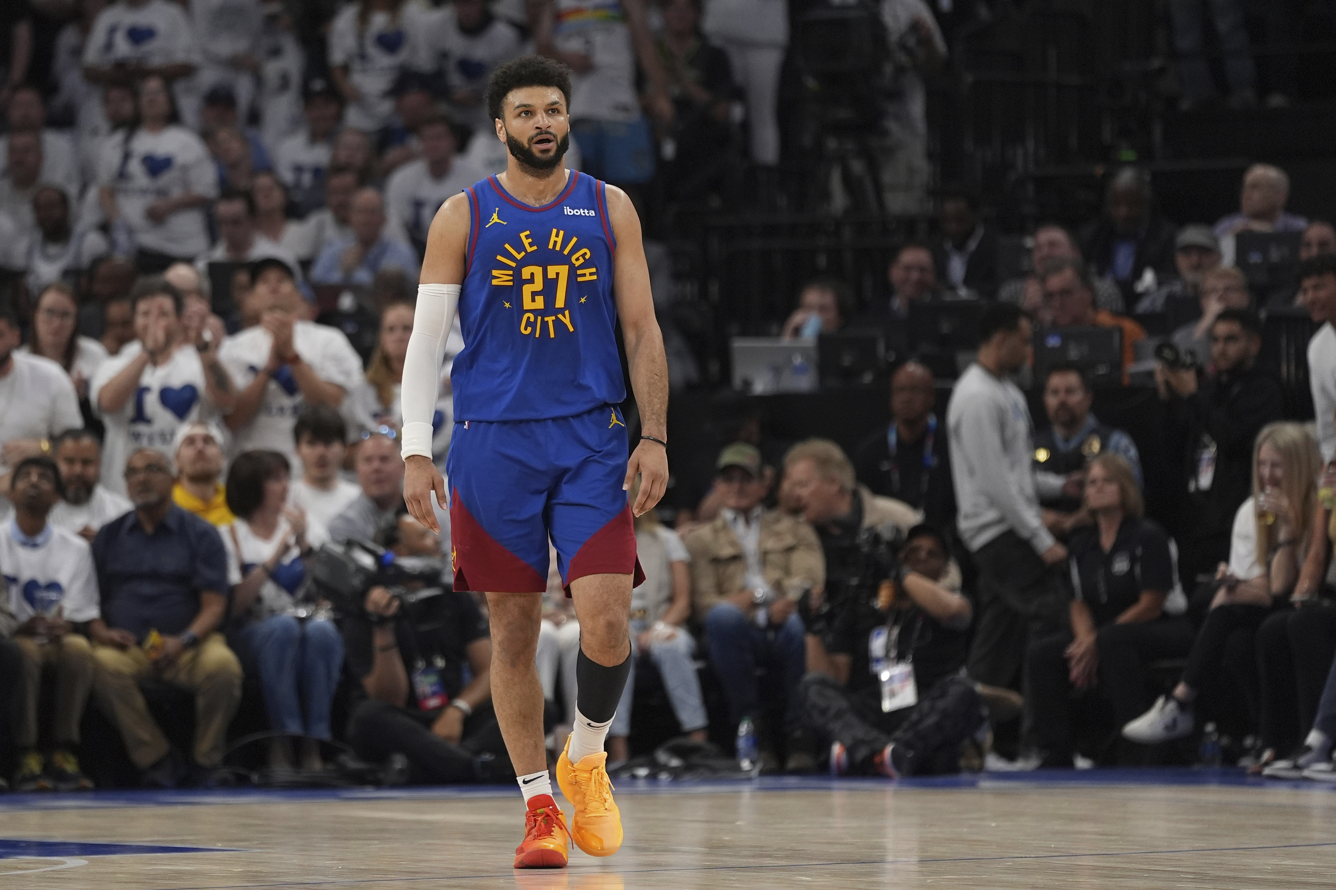 Denver Nuggets guard Jamal Murray walks on the court during the first half of Game 6 of the team's NBA basketball second-round playoff series against the Minnesota Timberwolves, Thursday, May 16, 2024, in Minneapolis. 