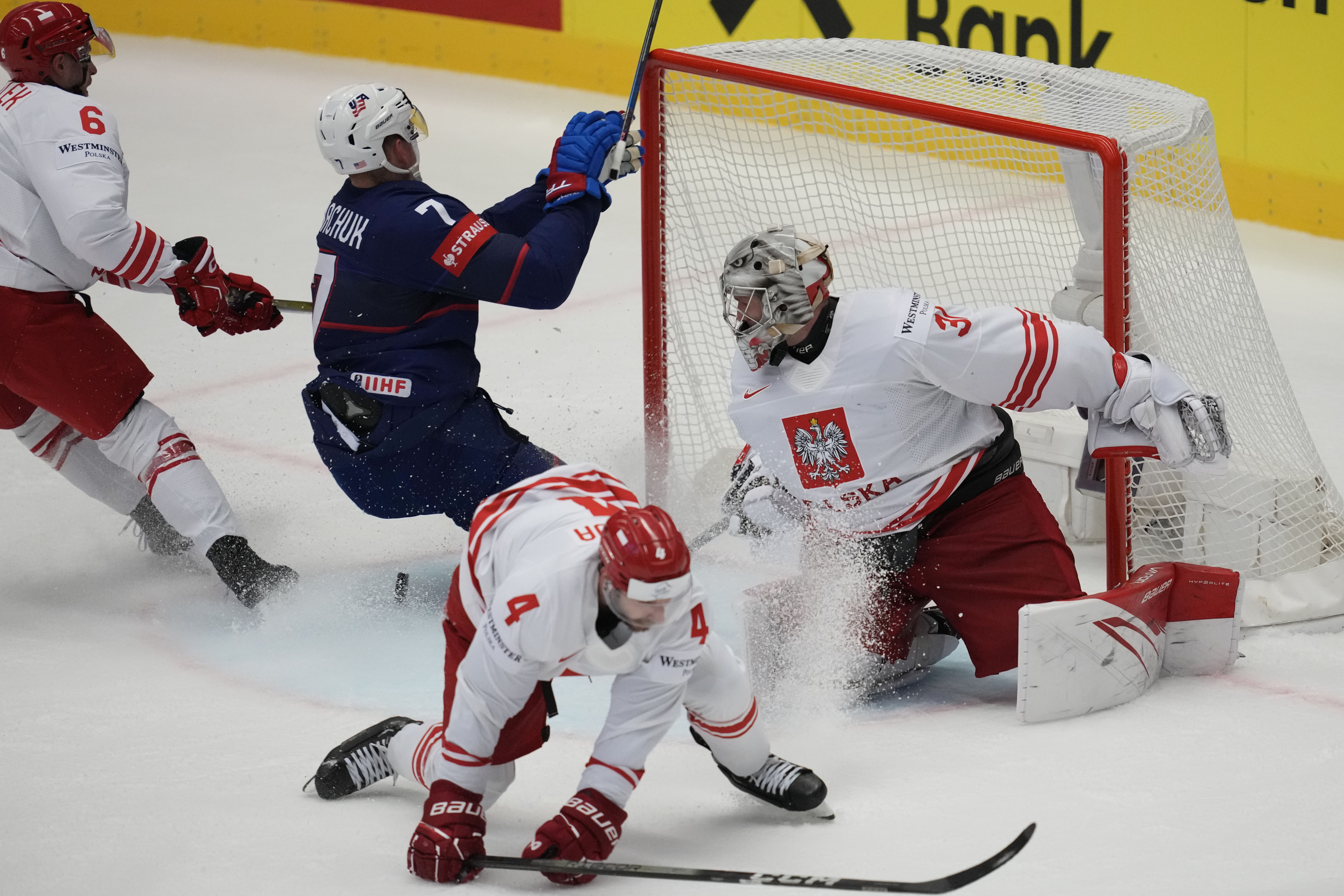 Unted States' Brady Tkachuk, second left, scores his side's second goal during the preliminary round match between Poland and United States at the Ice Hockey World Championships in Ostrava, Czech Republic, Friday, May 17, 2024. 