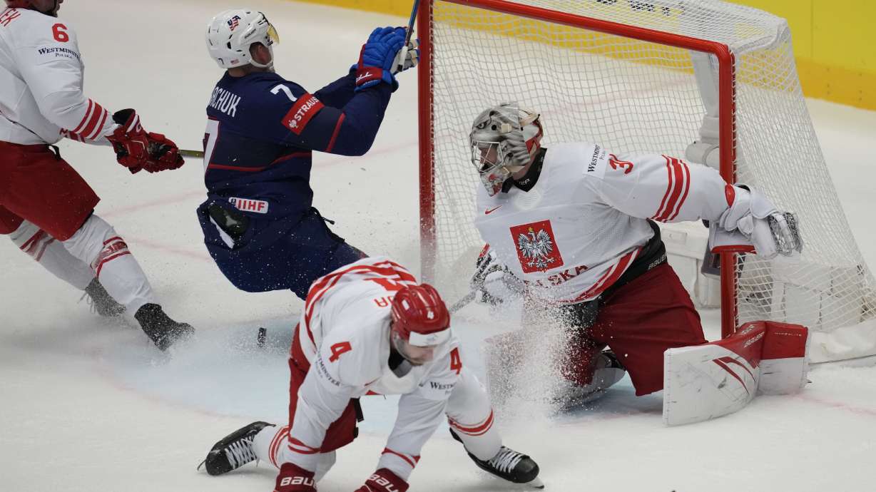 Unted States' Brady Tkachuk, second left, scores his side's second goal during the preliminary round match between Poland and United States at the Ice Hockey World Championships in Ostrava, Czech Republic, Friday, May 17, 2024.