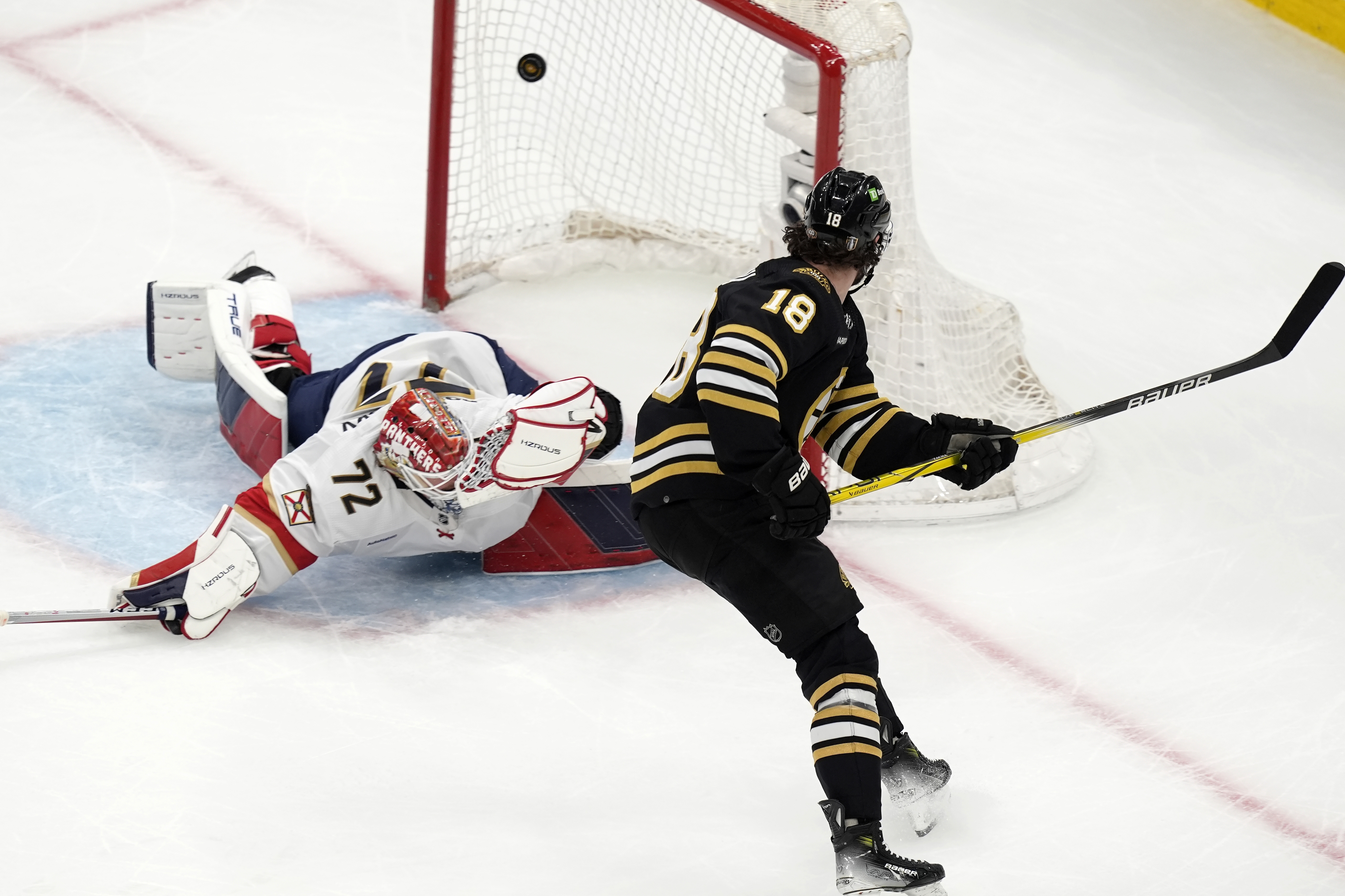Boston Bruins' Pavel Zacha (18) scores on Florida Panthers' Sergei Bobrovsky (72) during the first period in Game 6 of an NHL hockey Stanley Cup second-round playoff series Friday, May 17, 2024, in Boston. 