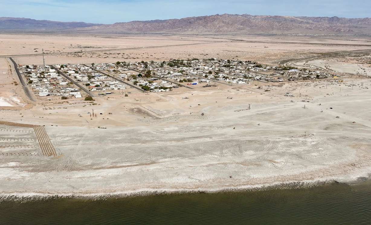Bombay Beach photographed beside the receding coastline of the Salton Sea, California on December 11, 2023.