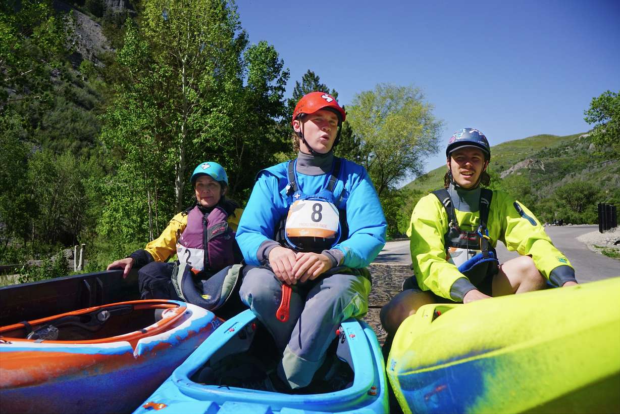 Whitewater kayakers are ferried to the start of the Provo River Race on Saturday.