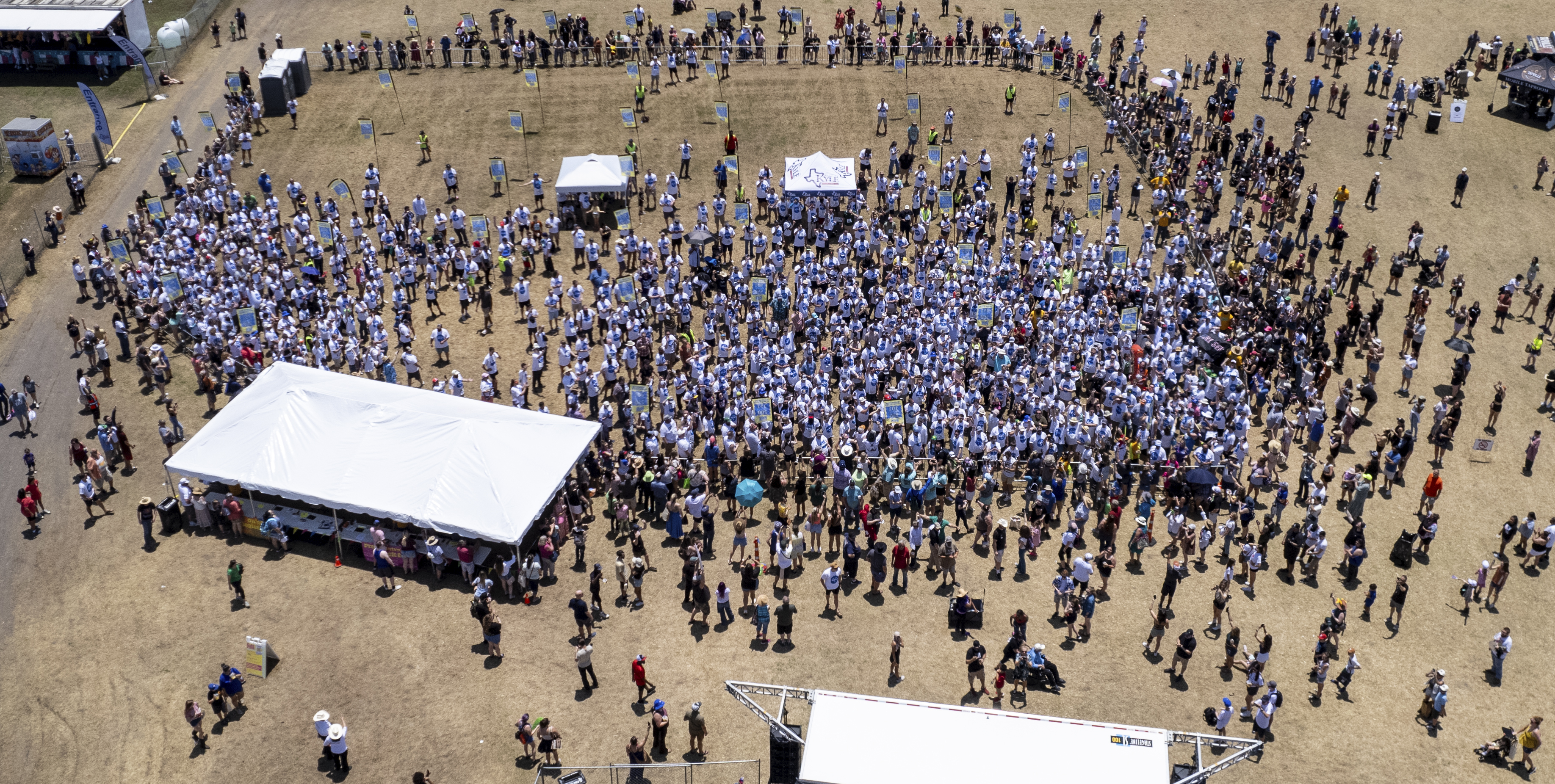 This photo taken by a drone and provided by the city of Kyle, Texas, shows an attempt by the city to break the world record for the largest gathering of people with one name, May 18, in Kyle. 