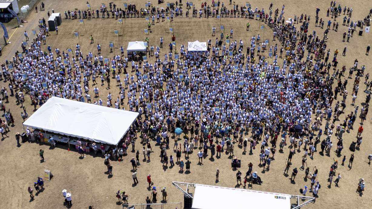 This photo taken by a drone and provided by the city of Kyle, Texas, shows an attempt by the city to break the world record for the largest gathering of people with one name, May 18, in Kyle.
