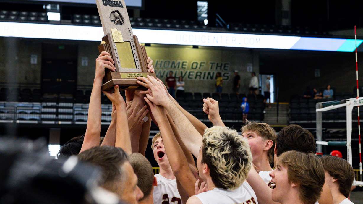 Maple Mountain celebrates their win over Bountiful for the high school 5A boys volleyball championship at the UCCU Center in Orem on Saturday, May 18, 2024.