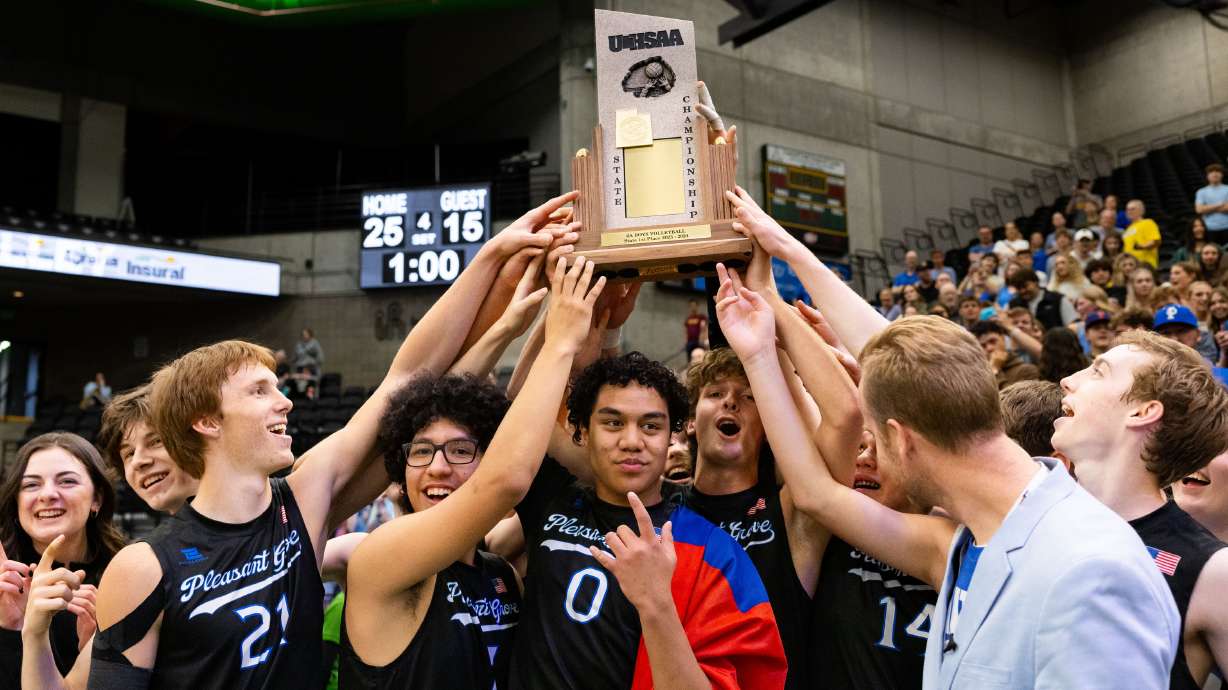 Pleasant Grove celebrates their win over Lone Peak for the high school 6A boys volleyball championship at the UCCU Center in Orem on Saturday, May 18, 2024.