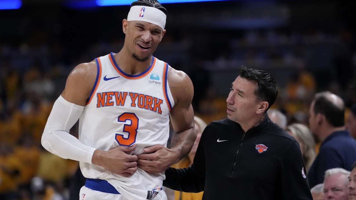 New York Knicks guard Josh Hart (3) reacts after getting injured during the first half of Game 6 against the Indiana Pacers in an NBA basketball second-round playoff series, Friday, May 17, 2024, in Indianapolis.