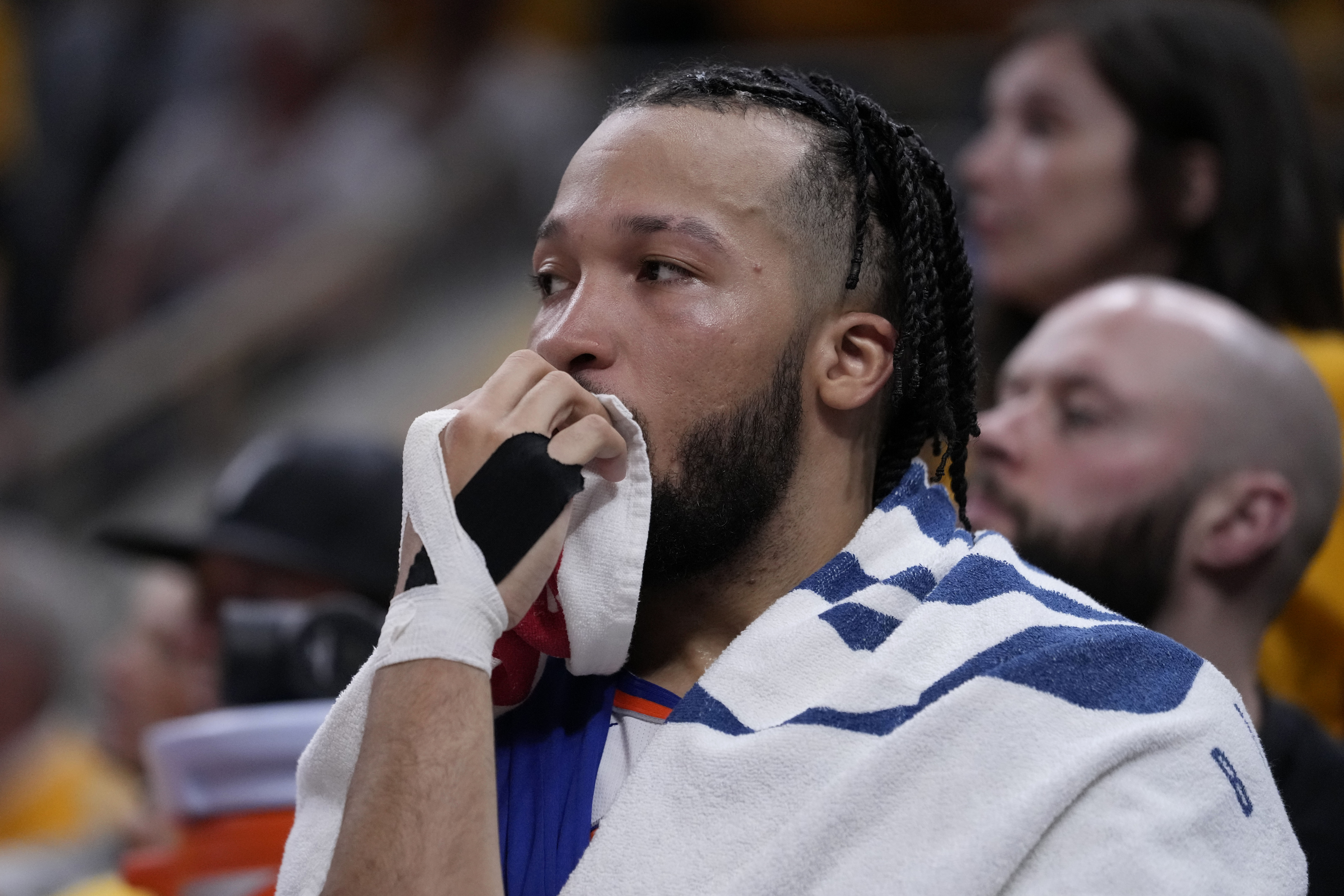 New York Knicks guard Jalen Brunson sits on the bench during the second half of Game 6 against the Indiana Pacers in an NBA basketball second-round playoff series, Friday, May 17, 2024, in Indianapolis. The Pacers won 116-103.