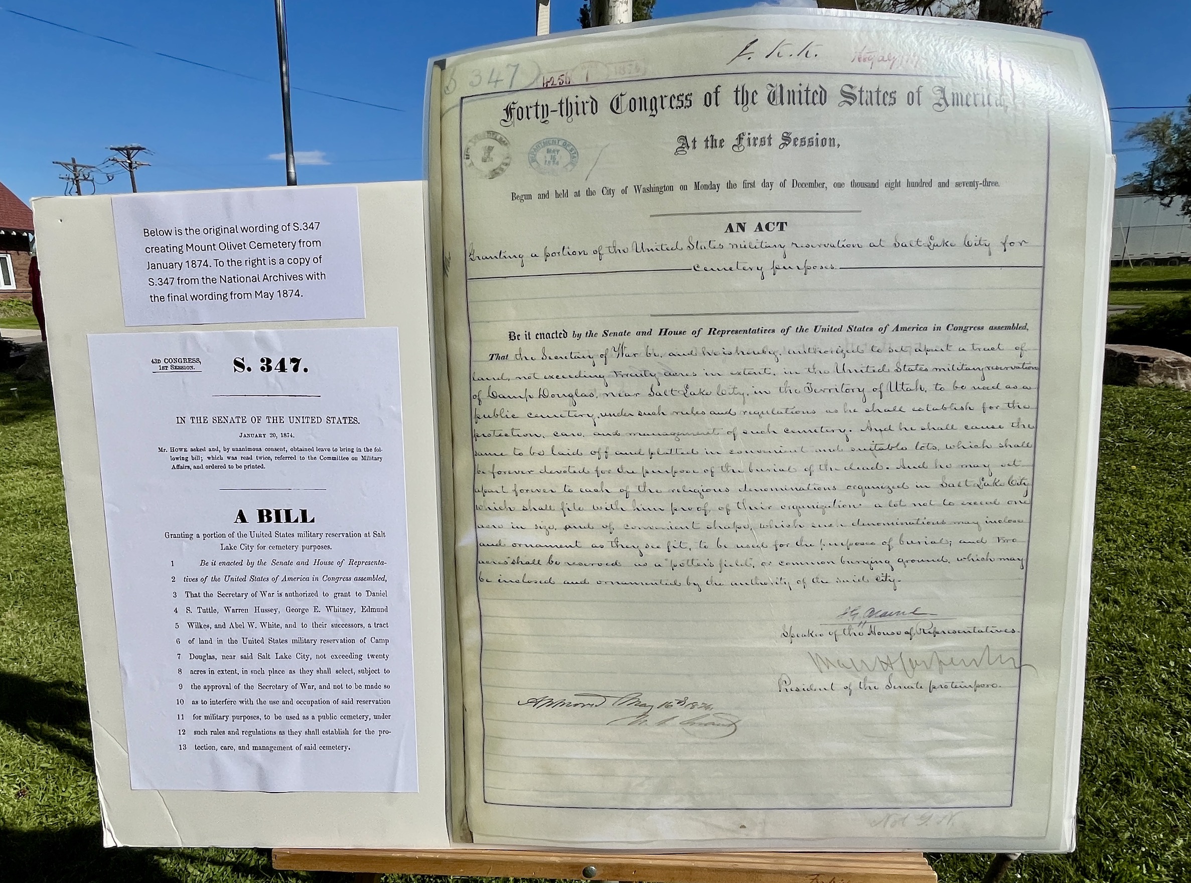 Replicas of the bill proposed and final version of the bill that led to the creation of Mount Olivet Cemetery in Salt Lake City are displayed at a ceremony at the cemetery on May 11.