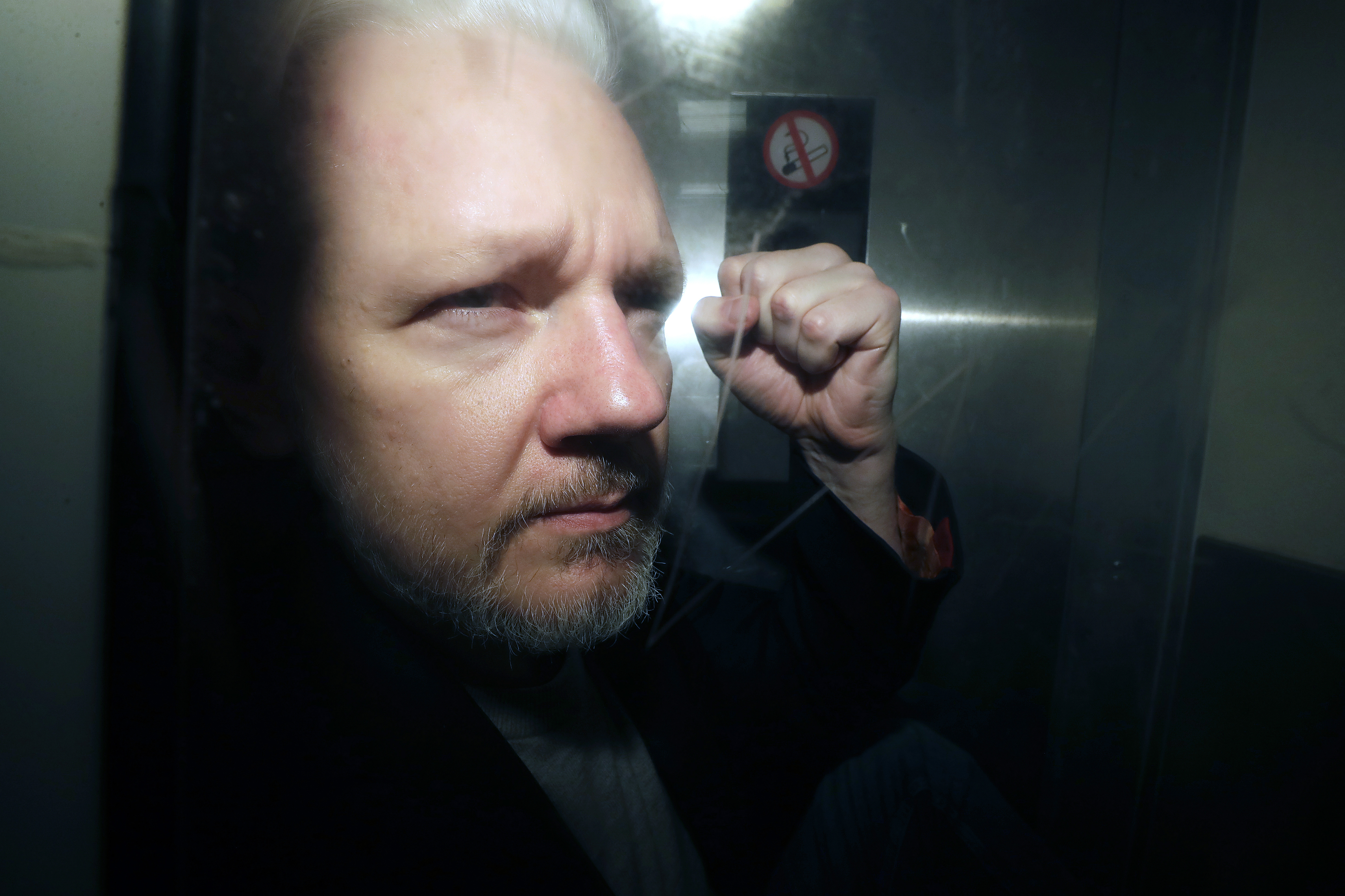 WikiLeaks founder Julian Assange being taken from court in London, May 1, 2019. A British court has ruled that Assange can appeal an order that he be extradited to the U.S. on espionage charges.