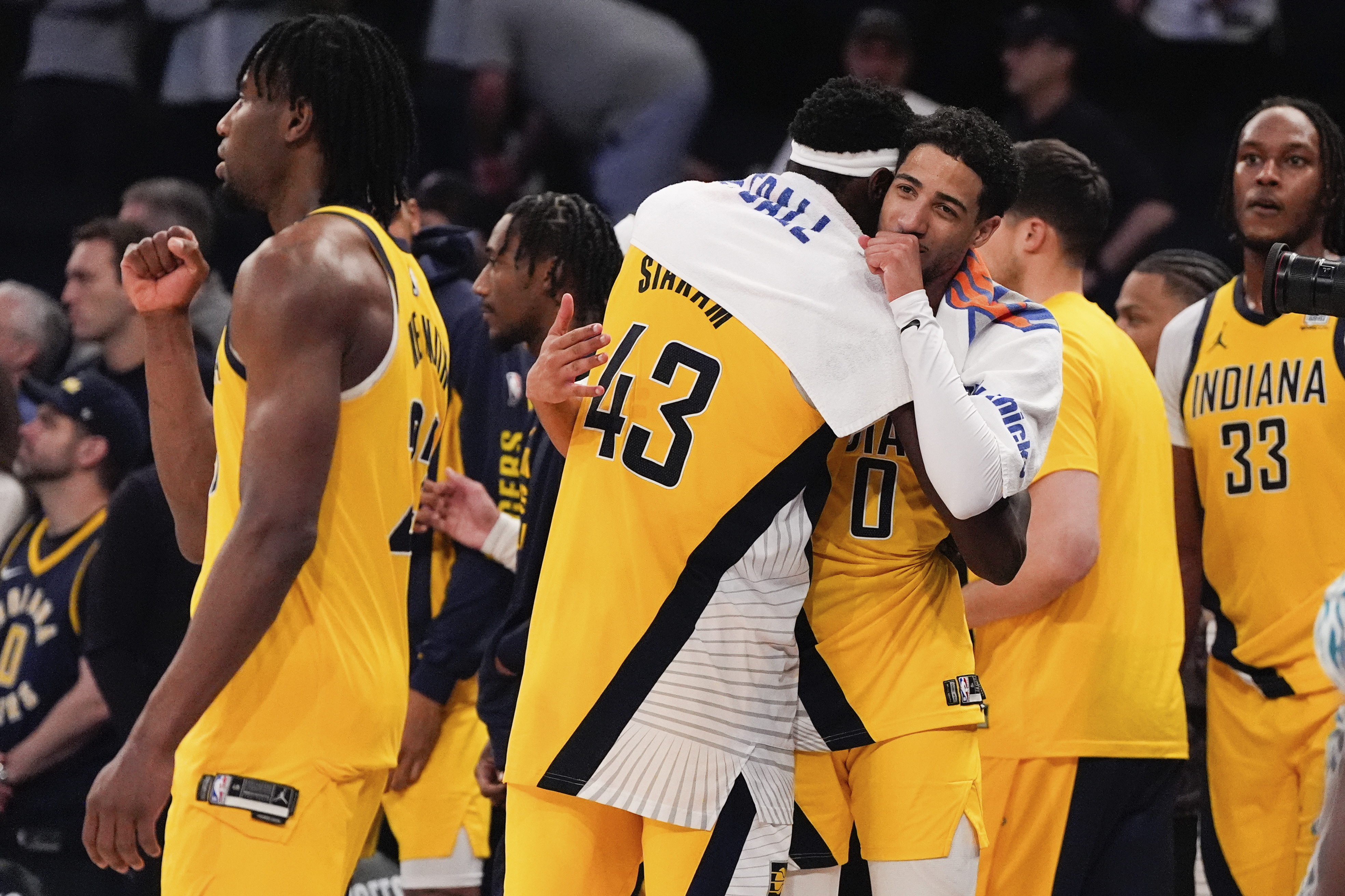Indiana Pacers forward Pascal Siakam (43) and guard Tyrese Haliburton (0) celebrate following Game 7 in an NBA basketball second-round playoff series against the New York Knicks, Sunday, May 19, 2024, in New York. 