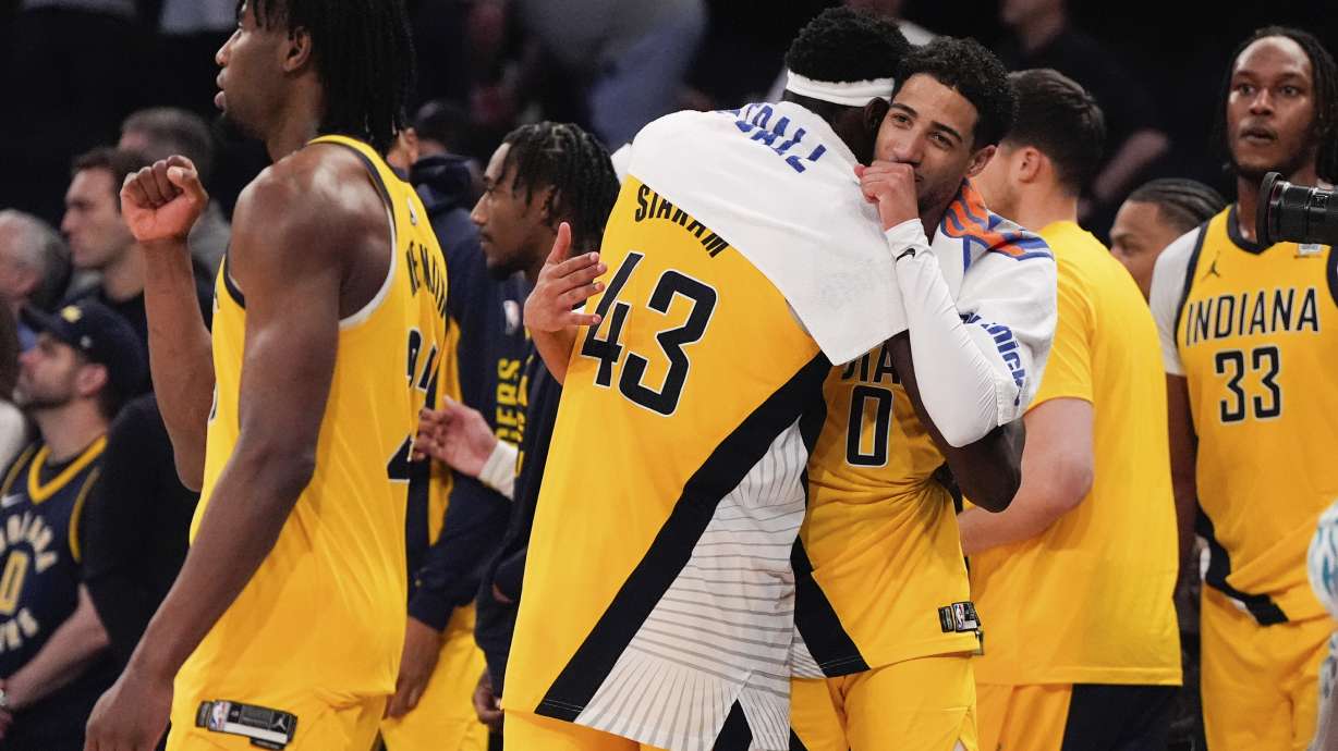 Indiana Pacers forward Pascal Siakam (43) and guard Tyrese Haliburton (0) celebrate following Game 7 in an NBA basketball second-round playoff series against the New York Knicks, Sunday, May 19, 2024, in New York.