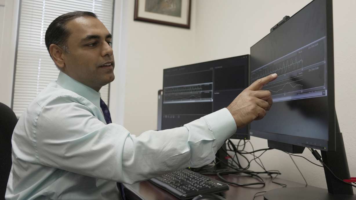 Dr. Roneil Malkani, assistant professor of neurology at Northwestern University Feinberg School of Medicine, shows an example of pink noise to slow brainwaves in deep sleep.