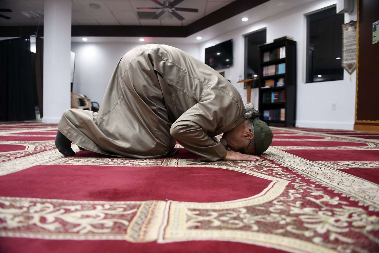 Wilfredo A. Ruiz, communications director for the Florida Council on American-Islamic Relations, prays for Ramadan at the mosque in the Islamic Center of Broward in Sunrise, Florida, on April 29, 2022.