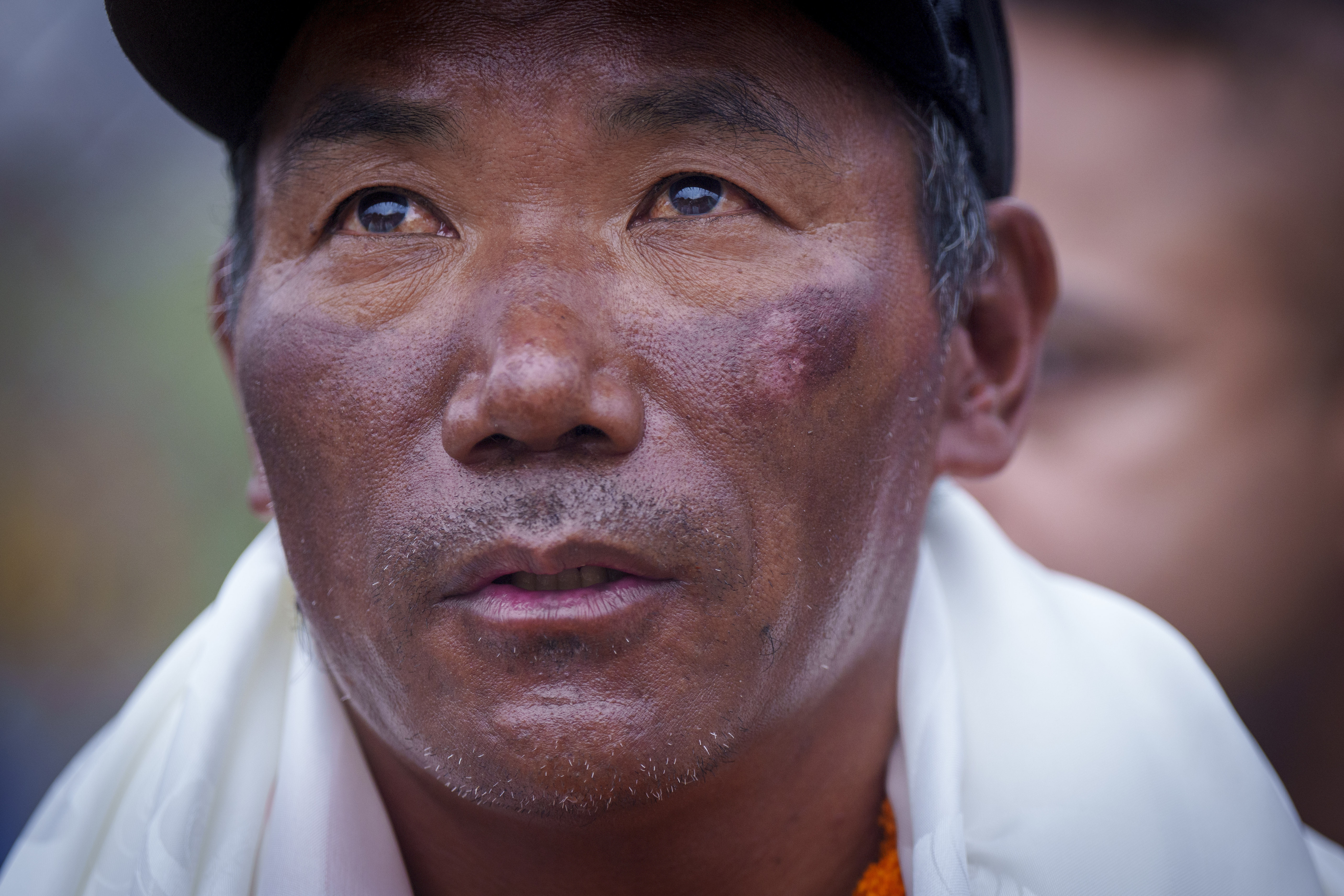 FILE- Veteran Sherpa guide Kami Rita returning after scaling Mount Everest for the 28th time arrives at the airport in Kathmandu, Nepal, May 25, 2023. Kami Rita scaled Mount Everest for a record 30th time Wednesday, completing his second climb this month to the top of the world.
