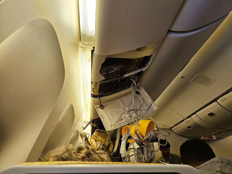 The interior of Singapore Airline flight SQ321 is pictured after an emergency landing at Bangkok's Suvarnabhumi International Airport, in Bangkok, Thailand Tuesday.