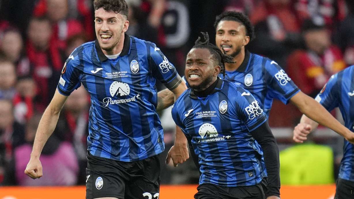 Atalanta's Ademola Lookman celebrates after scoring his side's first goal during the Europa League final soccer match between Atalanta and Bayer Leverkusen at the Aviva Stadium in Dublin, Ireland, Wednesday, May 22, 2024.