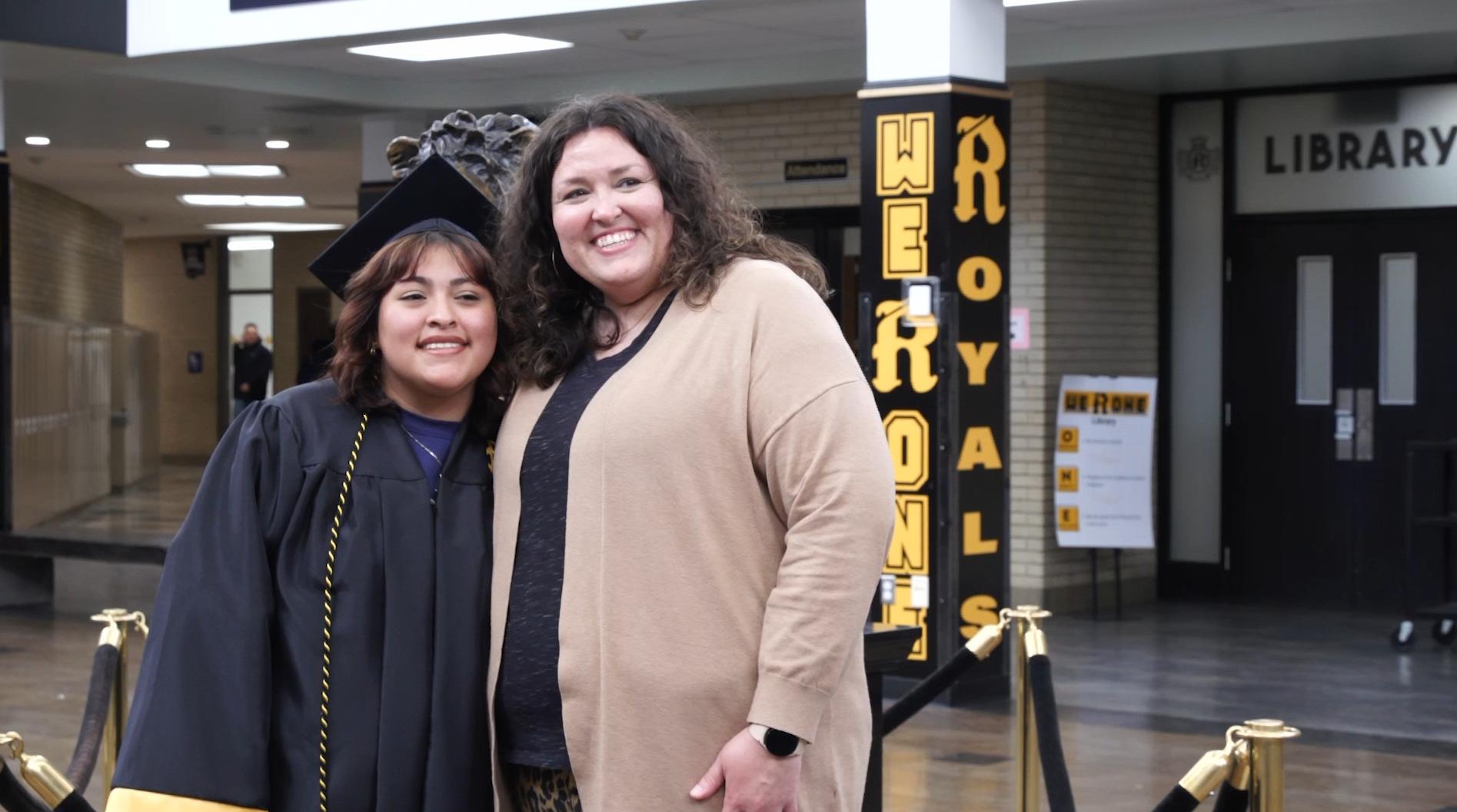 Samantha Mata and her mentor, Kristine Kitchens, pose to celebrate Samantha’s graduation from Roy High School.