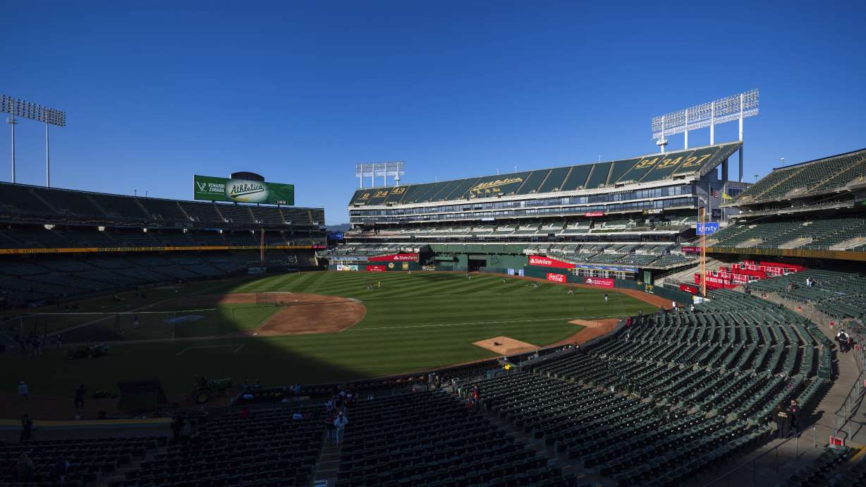 FILE - Fans walk to their seats before the start of a baseball game, April 2, 2024, in Oakland, Calif. The city of Oakland is selling its share of the Coliseum — home to the departing Oakland Athletics — to a local Black development group for at least $105 million, Mayor Sheng Thao announced Wednesday, May 22, 2024.