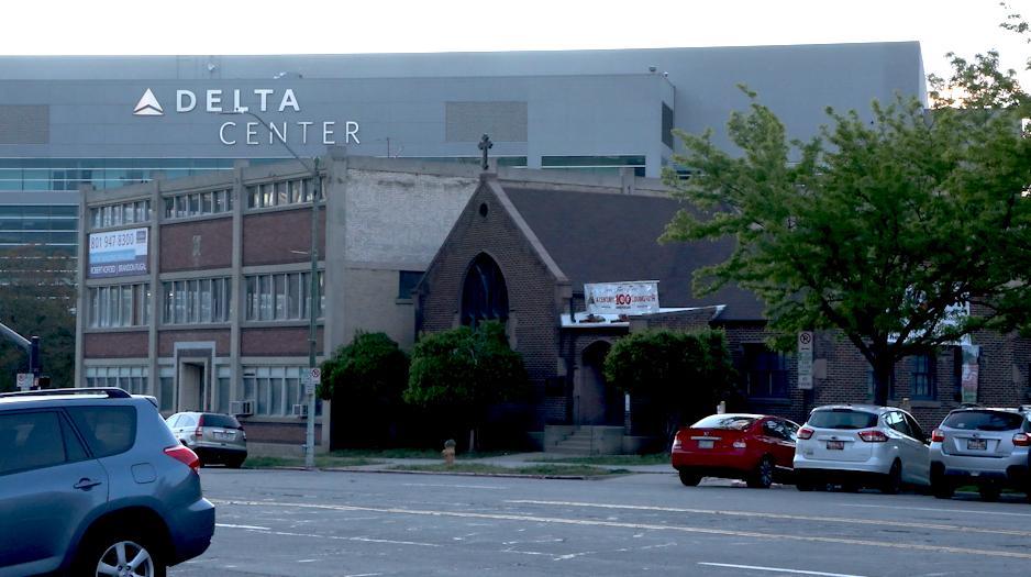 A view of Japantown Street, with the Japanese Church of Christ in the foreground and the Delta Center behind it across 300 West.