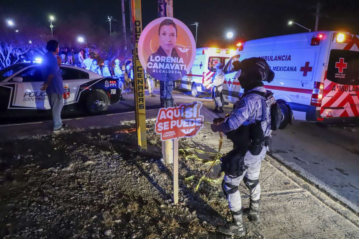 Security forces cordon off the area after a stage collapsed due to a gust of wind during an event attended by presidential candidate Jorge Álvarez Máynez in San Pedro Garza García, on the outskirts of Monterey, Mexico, Wednesday. At least nine people were killed and at least a dozen injured.