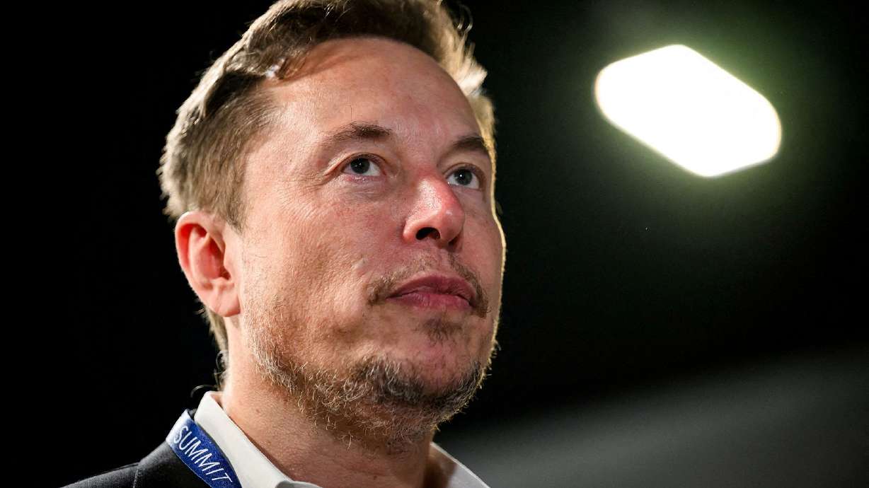 Tesla CEO Elon Musk is seen in Bletchley, Britain, on Nov. 1, 2023. Musk says artificial intelligence will take all our jobs and that's not necessarily a bad thing.