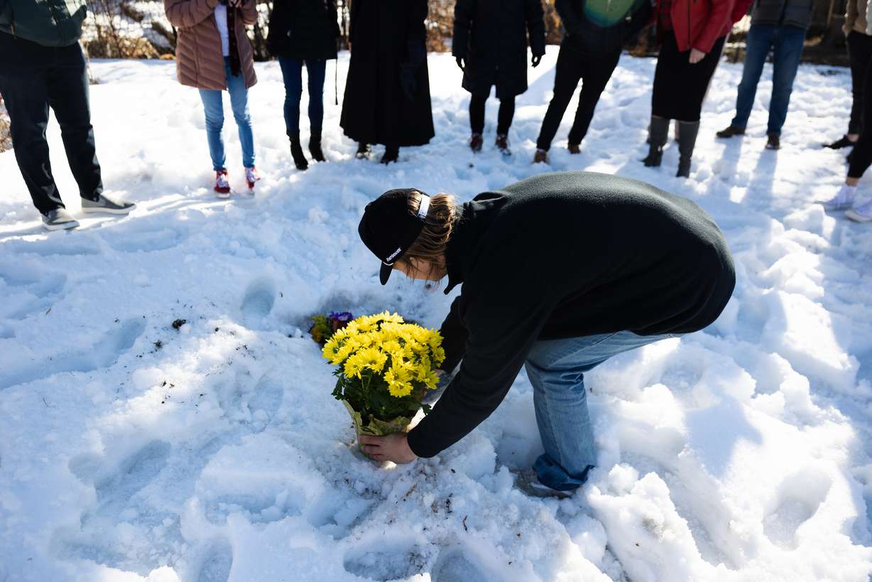 A bouquet of yellow daisies, Jordan Rasmussen’s favorite flower, is placed at his grave at Wasatch Lawn Memorial Park and Mortuary in Millcreek on March 5, 2023.