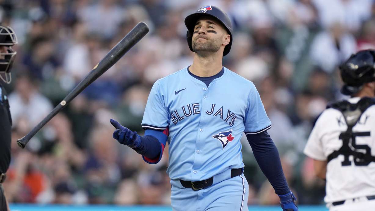 Toronto Blue Jays' Kevin Kiermaier flips his bat after striking out during the fifth inning of a baseball game against the Detroit Tigers, Thursday, May 23, 2024, in Detroit.