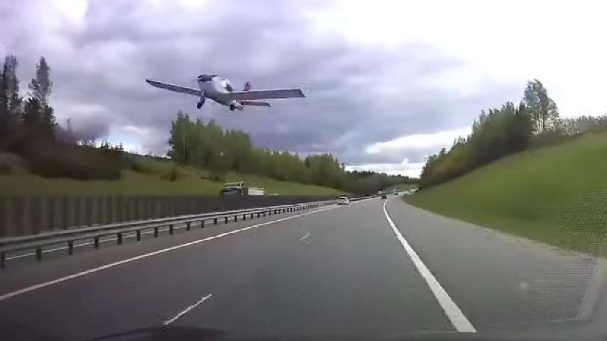 A plane comes a little too close to cars on a freeway last week.