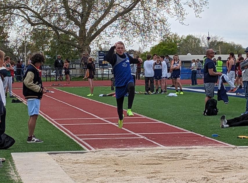 Alden Peterson, of Eden, competes in the long jump at the district championships at Bonneville Jr. High on May 2.