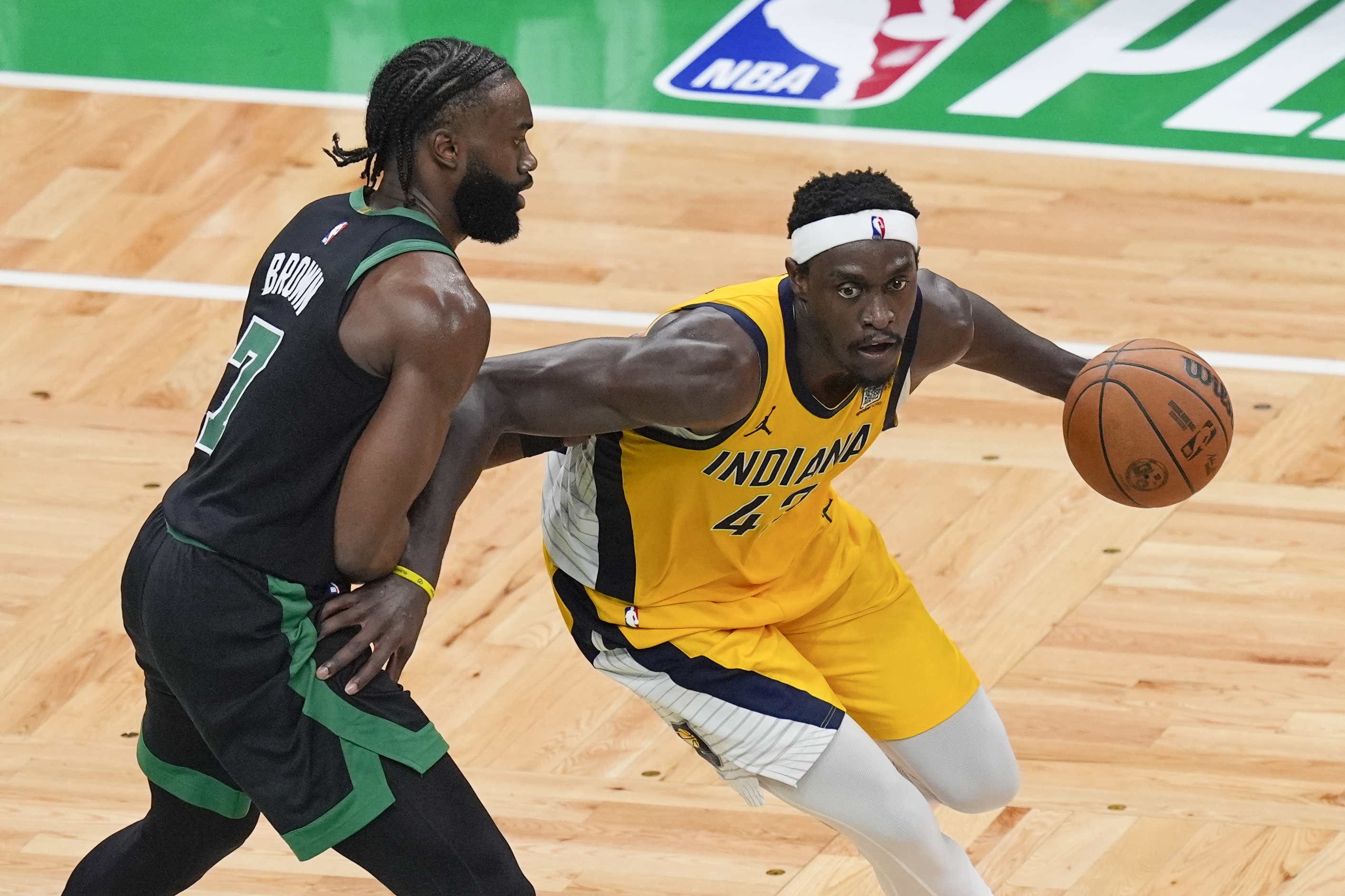 Indiana Pacers forward Pascal Siakam, right, is defended by Boston Celtics guard Jaylen Brown (7) during the second half of Game 2 of the NBA Eastern Conference basketball finals Thursday, May 23, 2024, in Boston. 