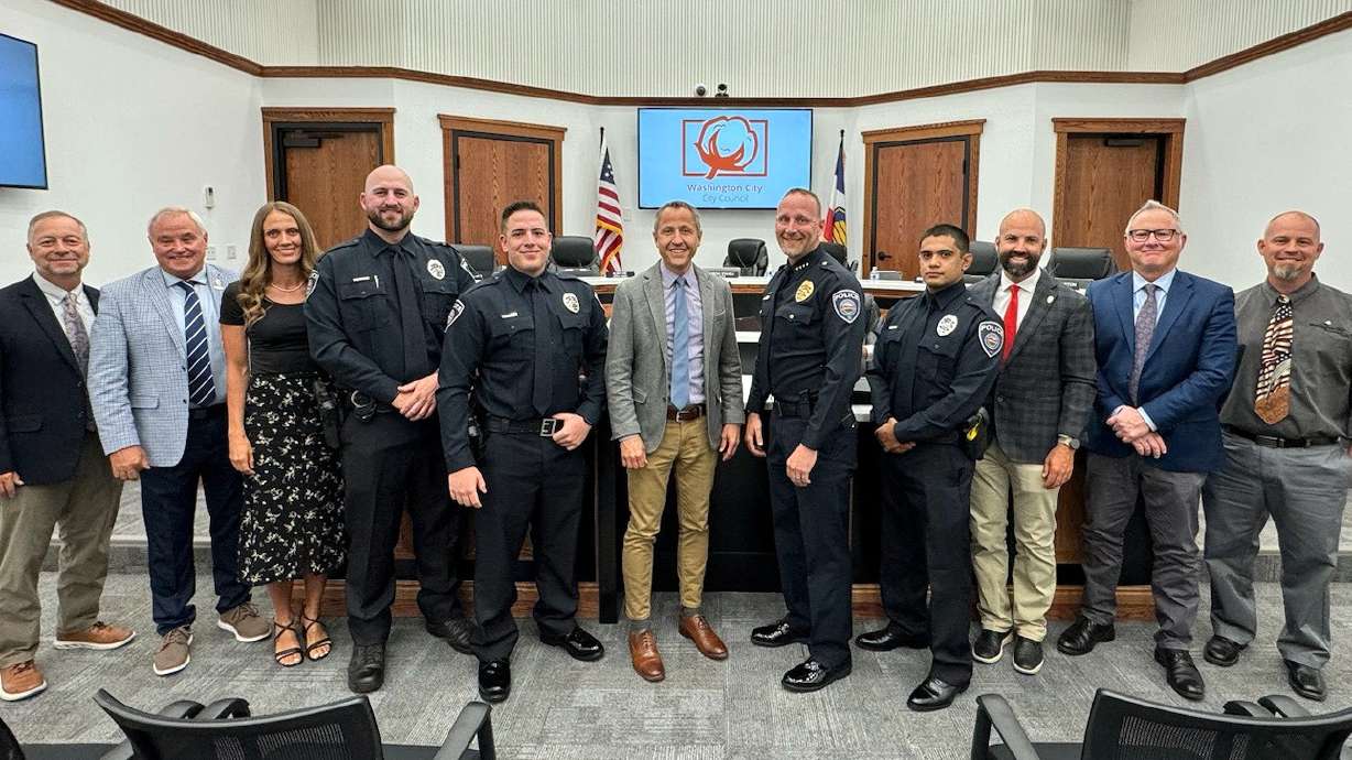 From left, Jeremy Redd, Kurt Ivie, Kimberly Casperson, Austin Kruger, Ethan Metcalf, Mayor Kress Staheli, Police Chief Jason Williams, Everest Alegria-Gamez, Craig Coats, Bret Henderson and Troy Belliston in Washington, Washington County, Wednesday.