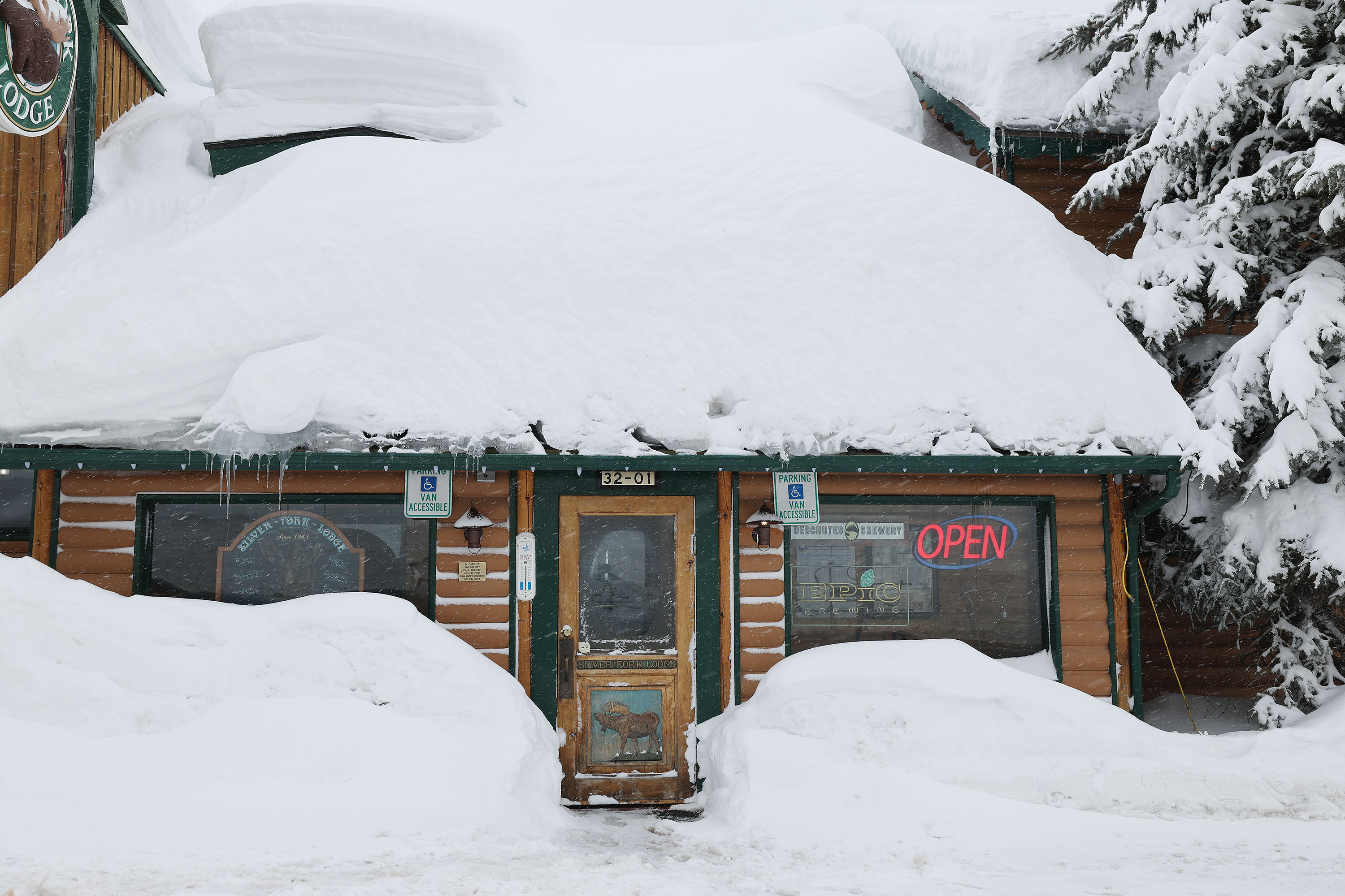 The Silver Fork Lodge is covered in snow in Brighton on Jan. 11, 2023.