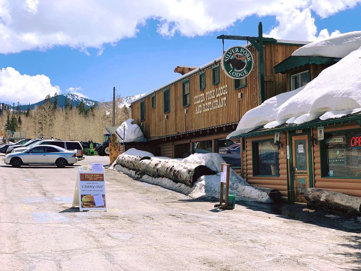 The town of Brighton took a first step Tuesday in potentially purchasing the well-loved Silver Fork Lodge.