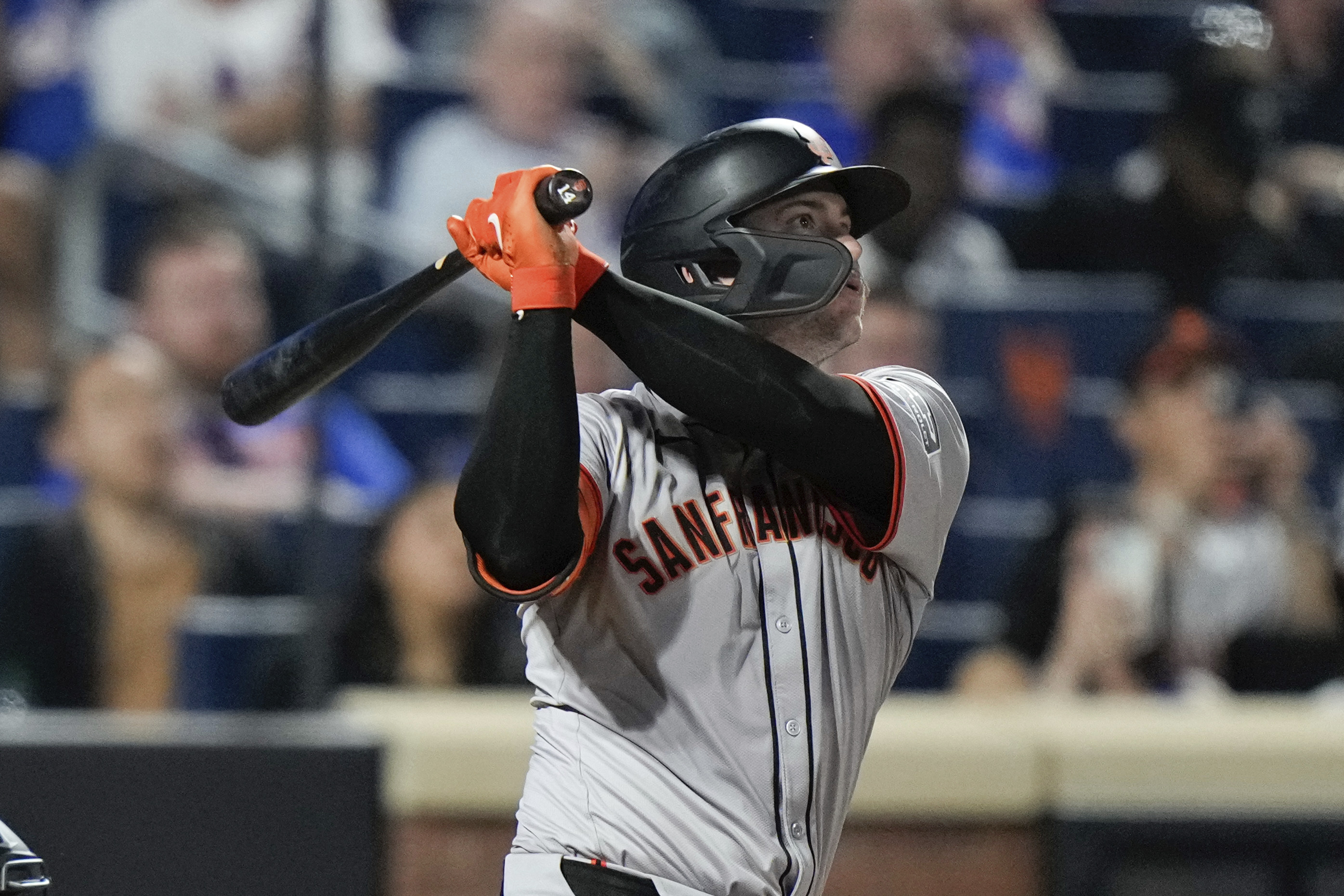 San Francisco Giants' Patrick Bailey watches his grand slam against the New York Mets during the eighth inning of a baseball game Friday, May 24, 2024, in New York. 