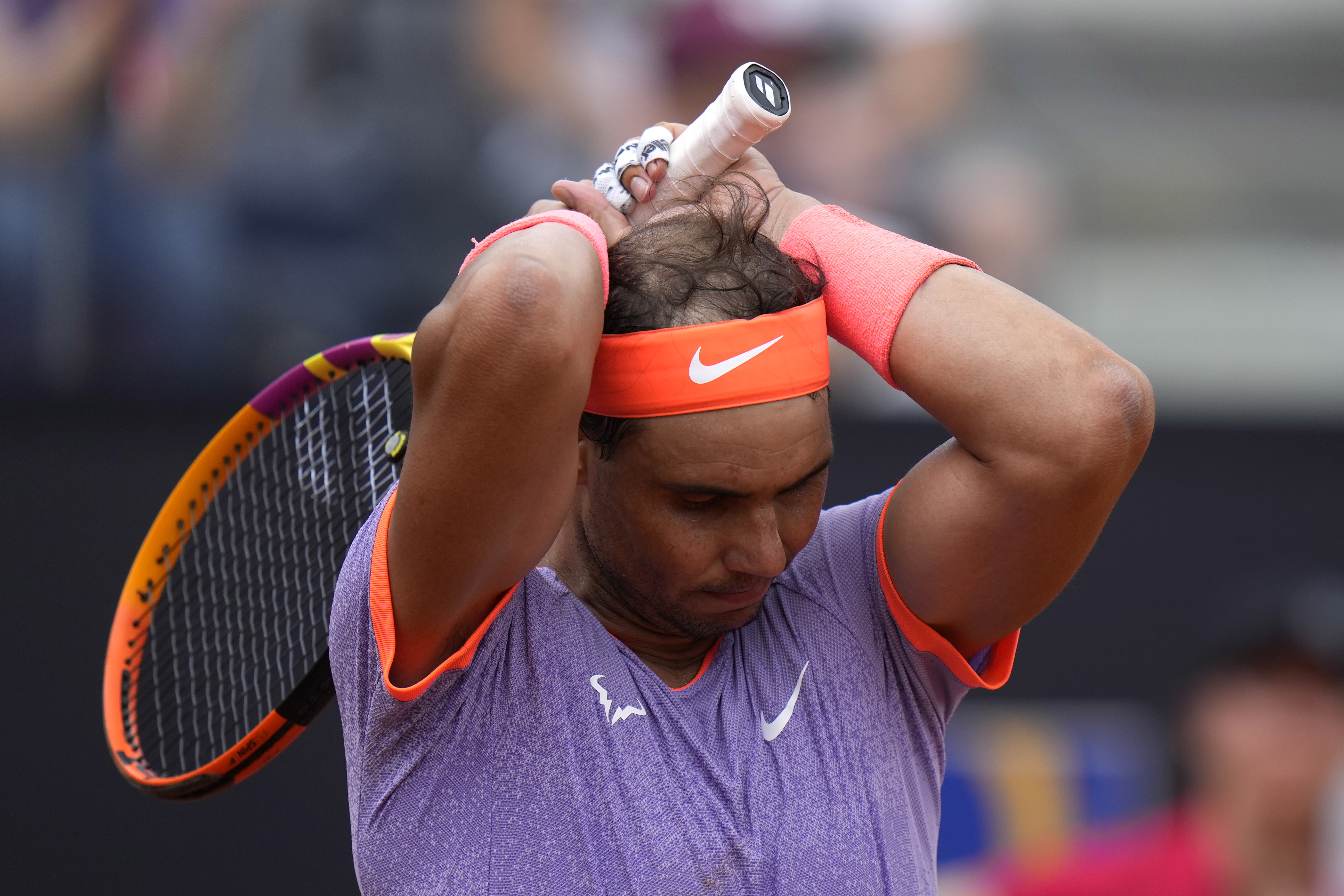 Spain's Rafael Nadal reacts after losing a point during his match against Belgium's Zizou Bergs at the Italian Open tennis tournament, in Rome, Thursday, May 9, 2024. 