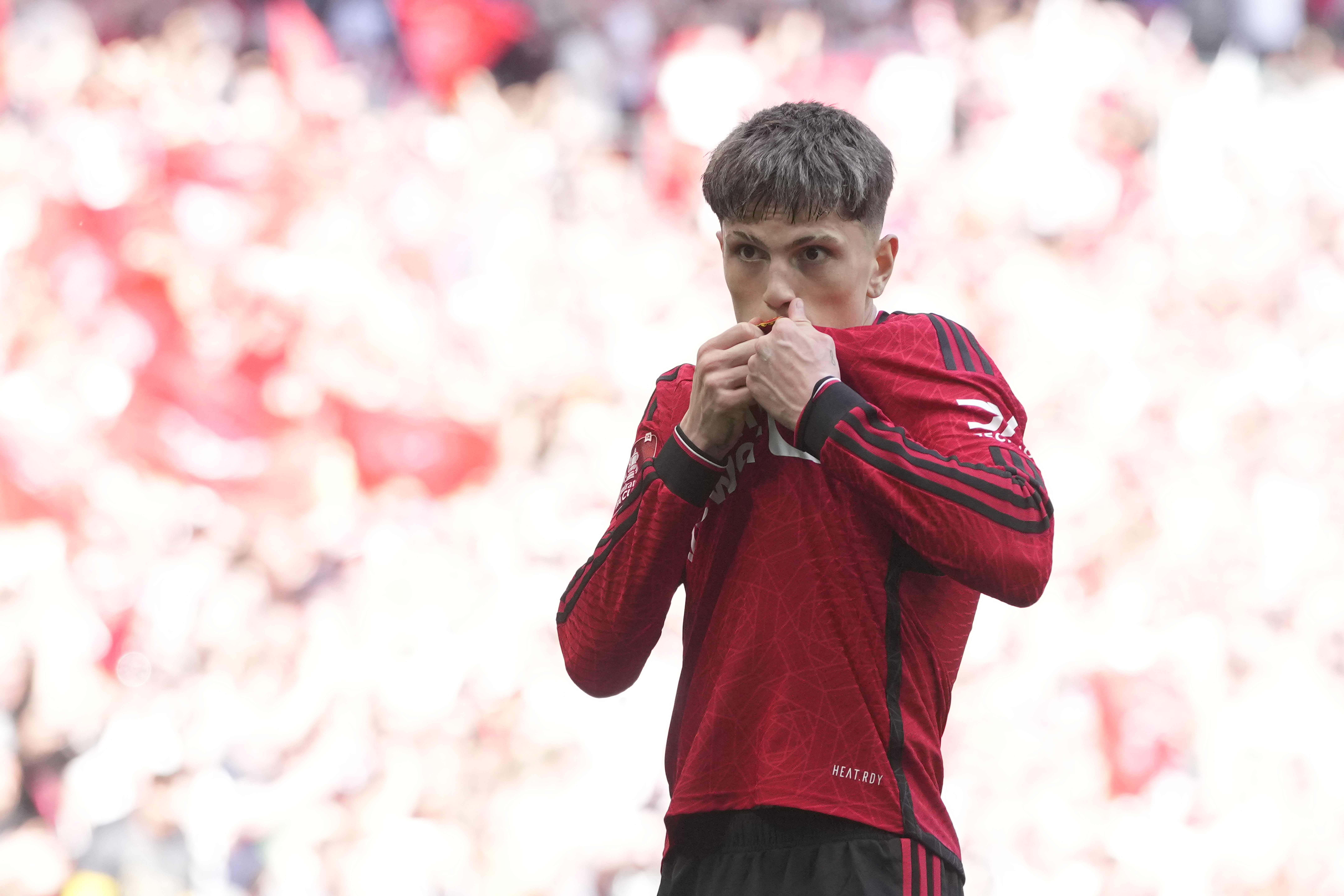 Manchester United's Alejandro Garnacho celebrates after scoring his side's opening goal during the English FA Cup final soccer match between Manchester City and Manchester United at Wembley Stadium in London, Saturday, May 25, 2024.