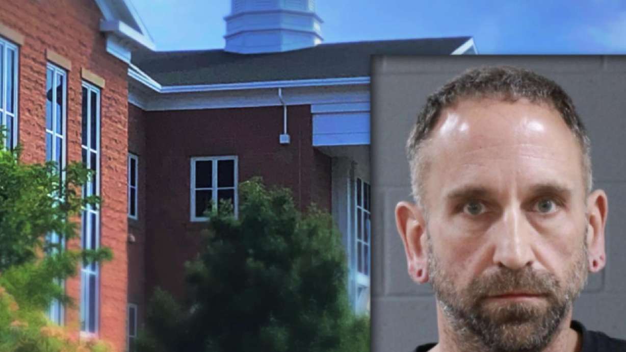 Composite image with background stock photo of 5th District Courtroom and overlay booking photo of Damon Roy Campbell, 50, of Washington City, booking photo taken in Washington County on Oct. 24, 2022.