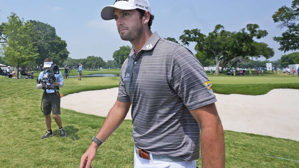 Davis Riley walks from the ninth hole during the third round of the Charles Schwab Challenge golf tournament at Colonial Country Club in Fort Worth, Texas, Saturday, May 25, 2024.