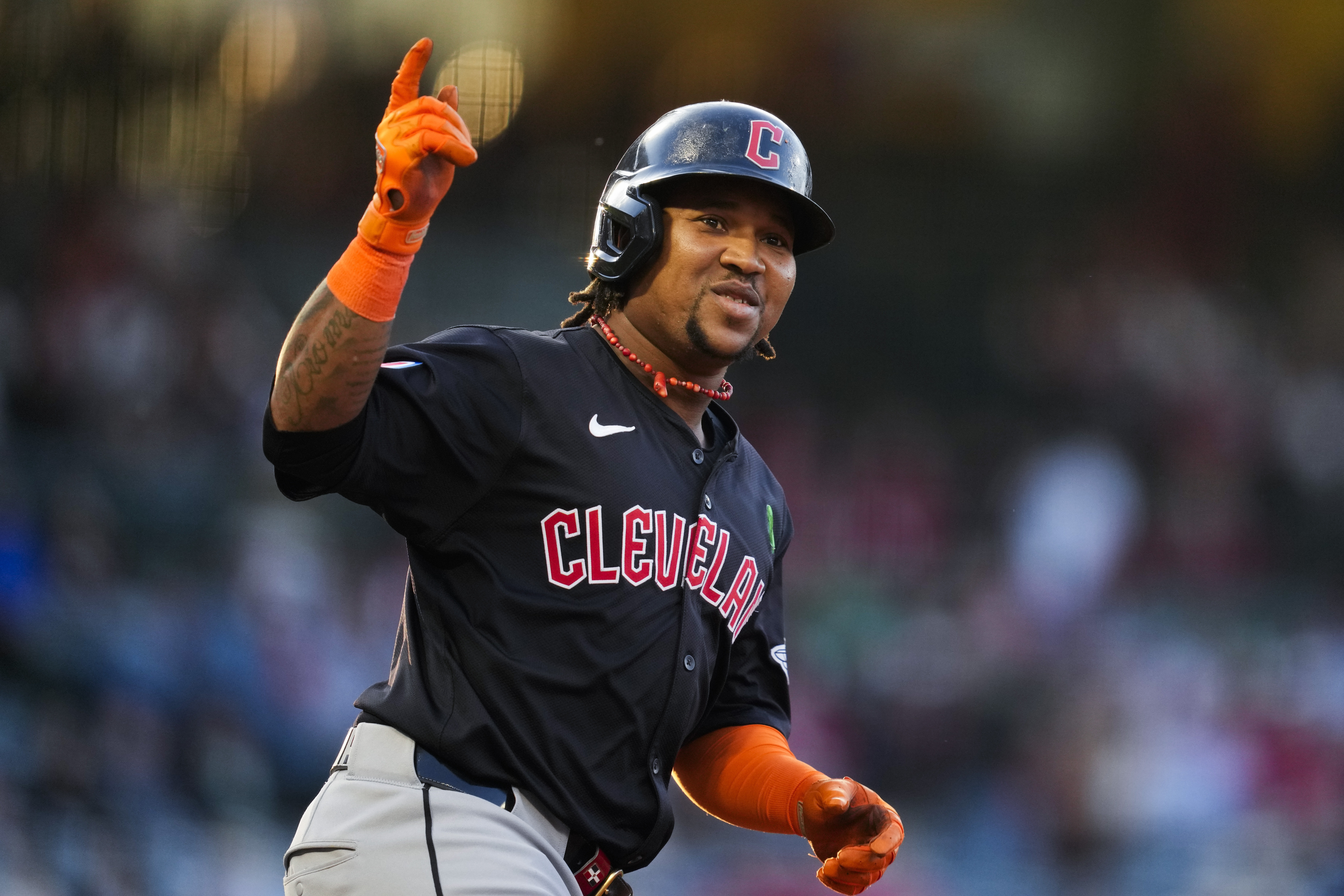 Cleveland Guardians' José Ramírez celebrates as he runs the bases after hitting a home run during the third inning of a baseball game against the Los Angeles Angels in Anaheim, Calif., Saturday, May 25, 2024. Tyler Freeman also scored. 