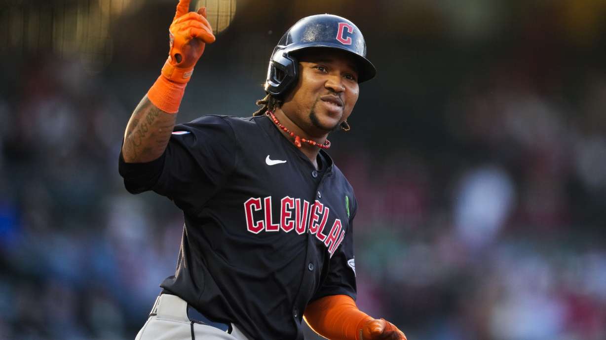 Cleveland Guardians' José Ramírez celebrates as he runs the bases after hitting a home run during the third inning of a baseball game against the Los Angeles Angels in Anaheim, Calif., Saturday, May 25, 2024. Tyler Freeman also scored.