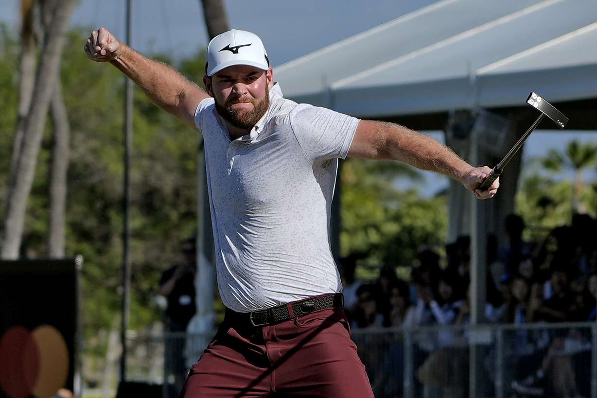 In this Jan. 14, 2024 file photo, Grayson Murray celebrates winning the Sony Open golf event at Waialae Country Club in Honolulu. The two-time PGA Tour winner died Saturday morning, May 25, 2024 at age 30, one day after he withdrew from the Charles Schwab Cup Challenge at Colonial.
